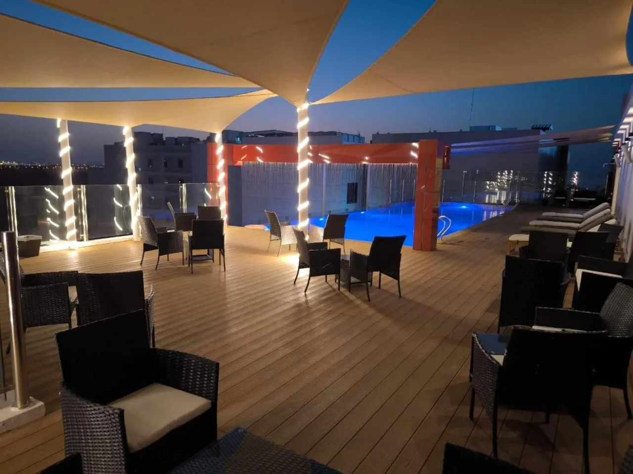 Swimming pool in Carnelian Muscat - Airport Hotel