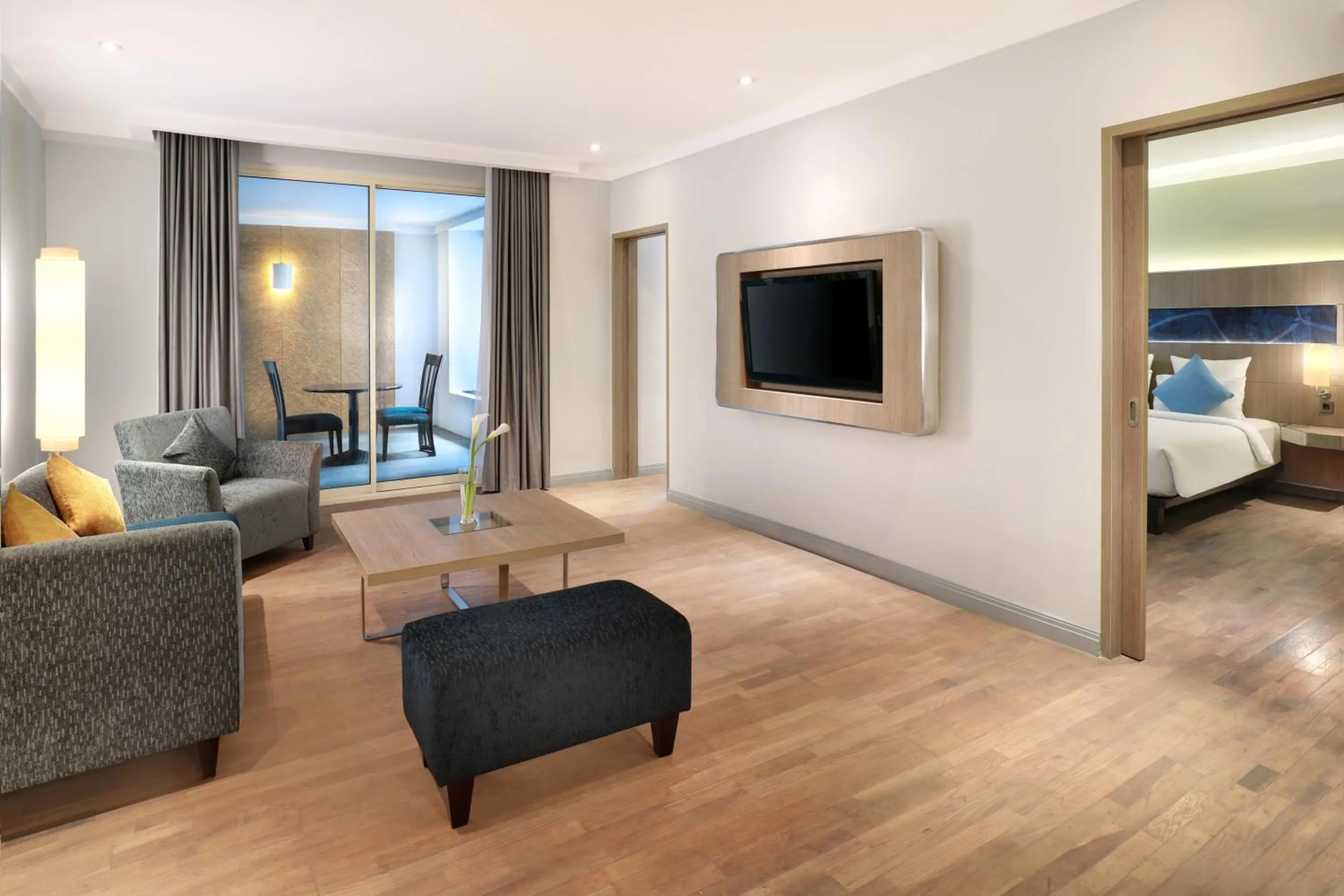 Living room, Bed in Novotel Jakarta Mangga Dua Square