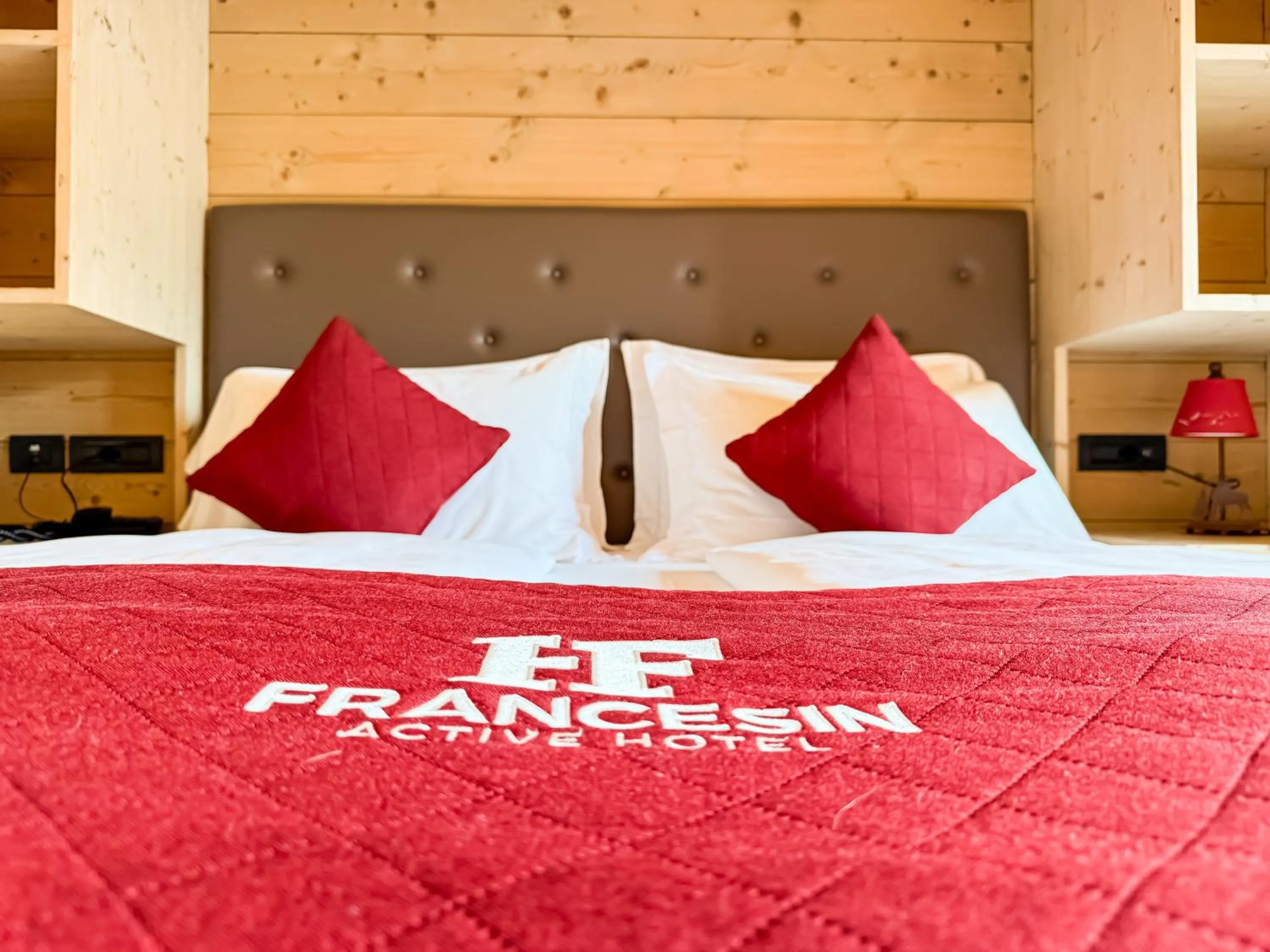 Bed in Francesin Active Hotel