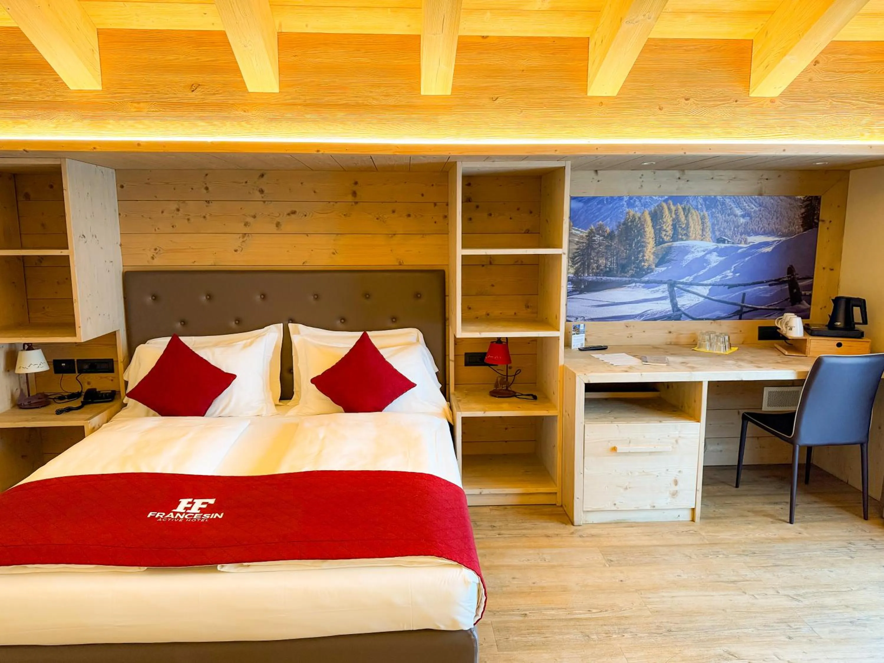 Bed in Francesin Active Hotel