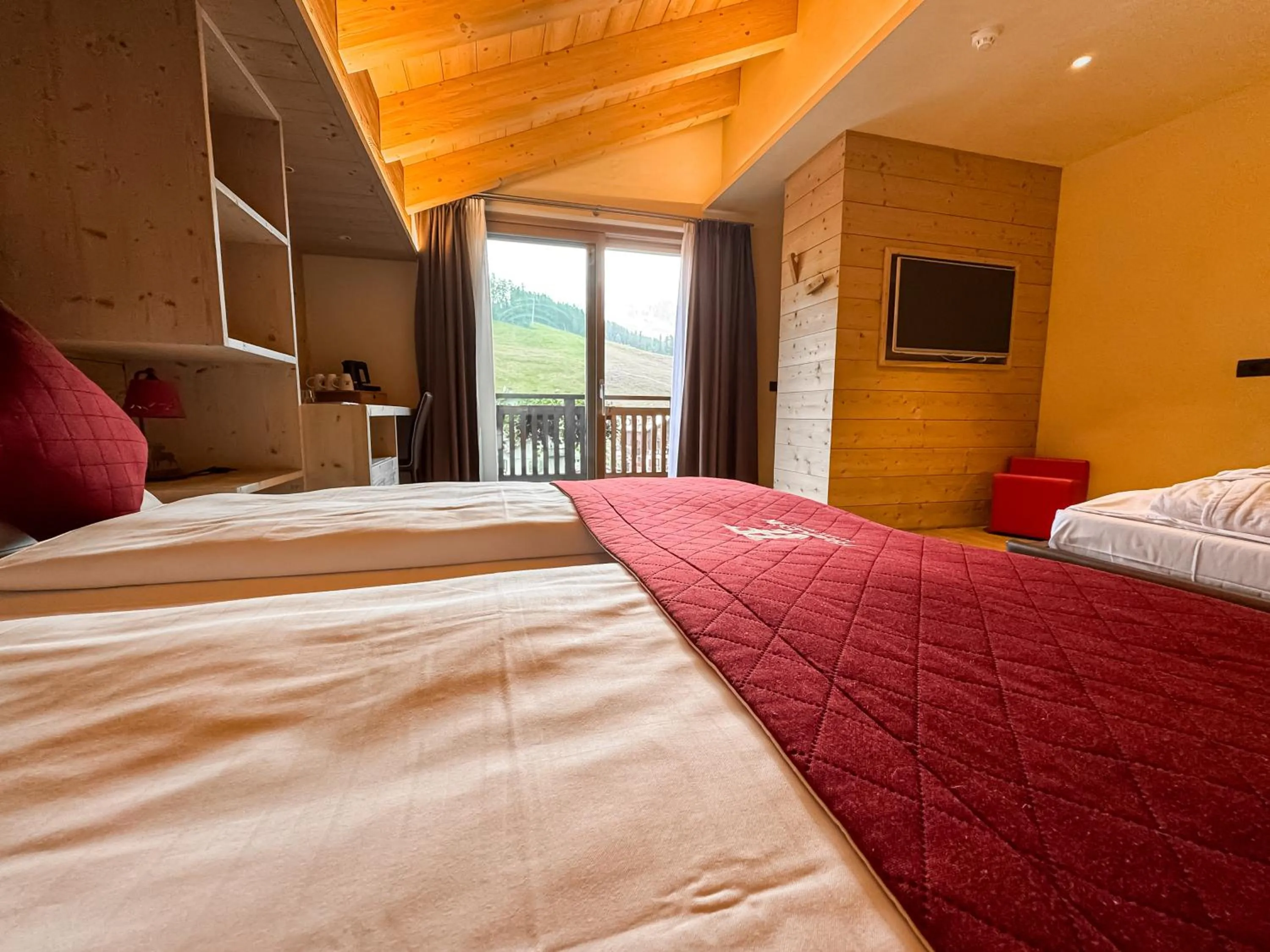 Bed in Francesin Active Hotel