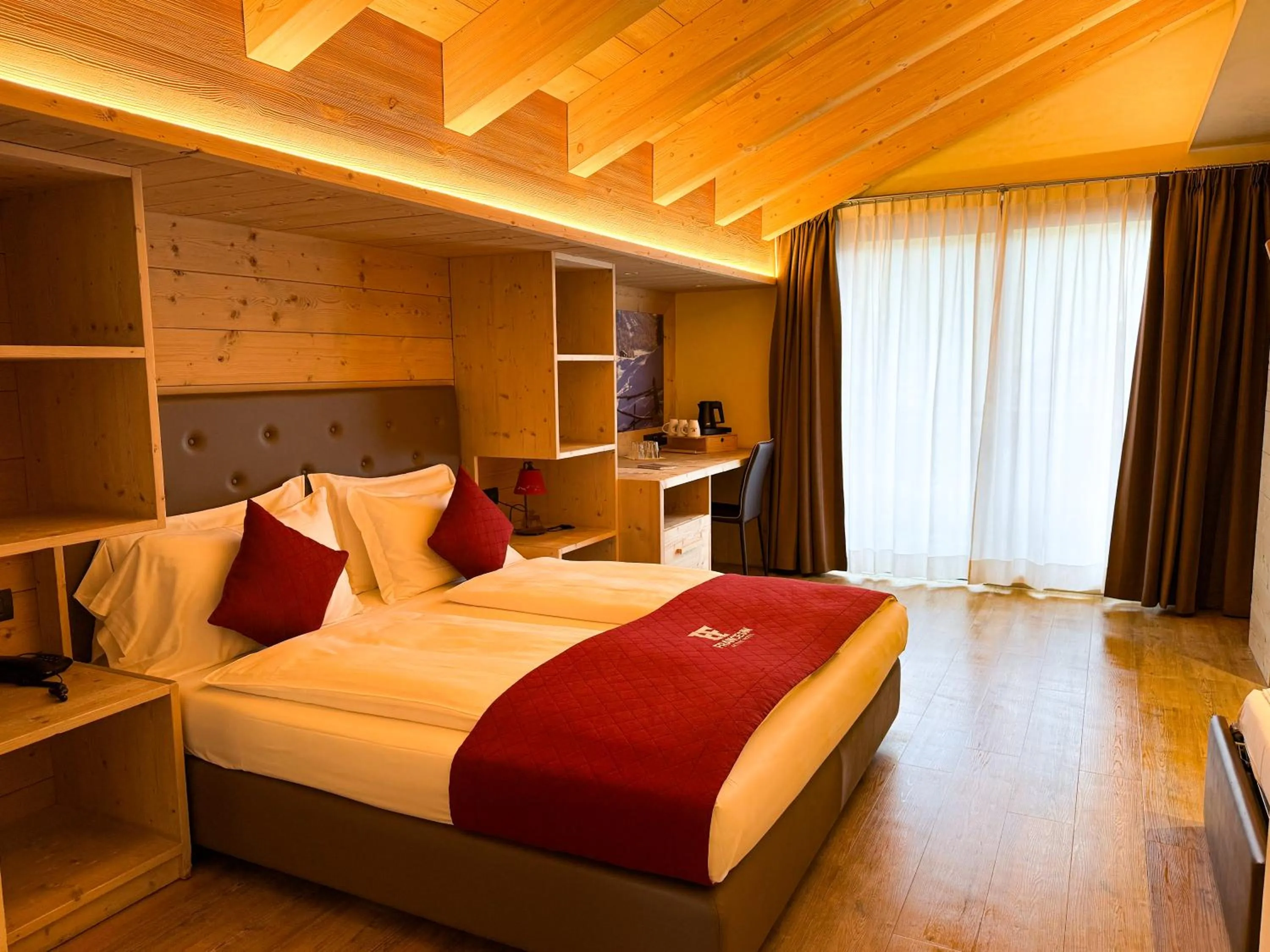 Bed in Francesin Active Hotel