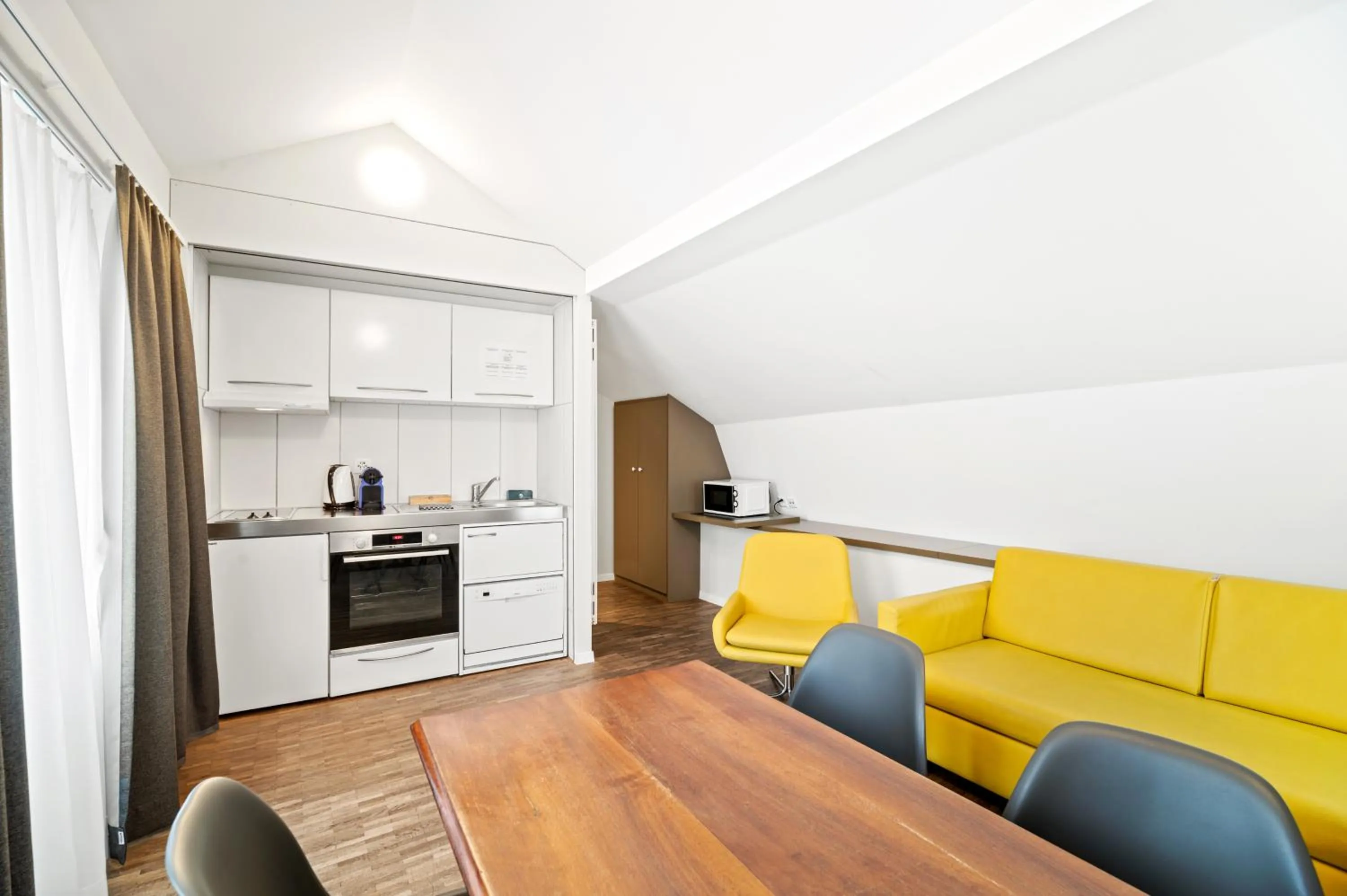 Kitchen or kitchenette in Aparthotel Hine Adon Fribourg