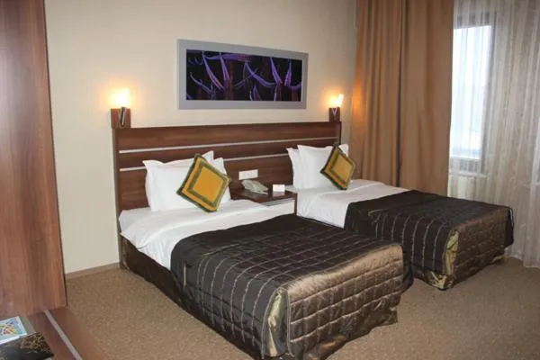 Bed in Lifos Hotel
