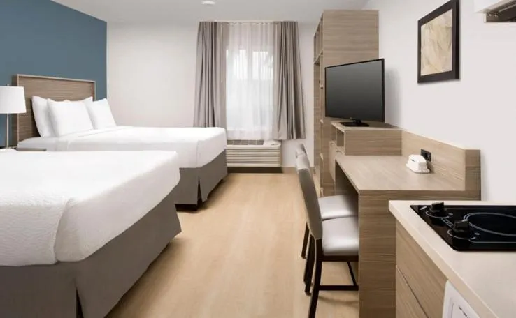 Photo of the whole room, Bed in WoodSpring Suites Seattle Redmond