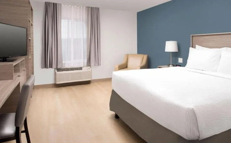 Bed in WoodSpring Suites Seattle Redmond