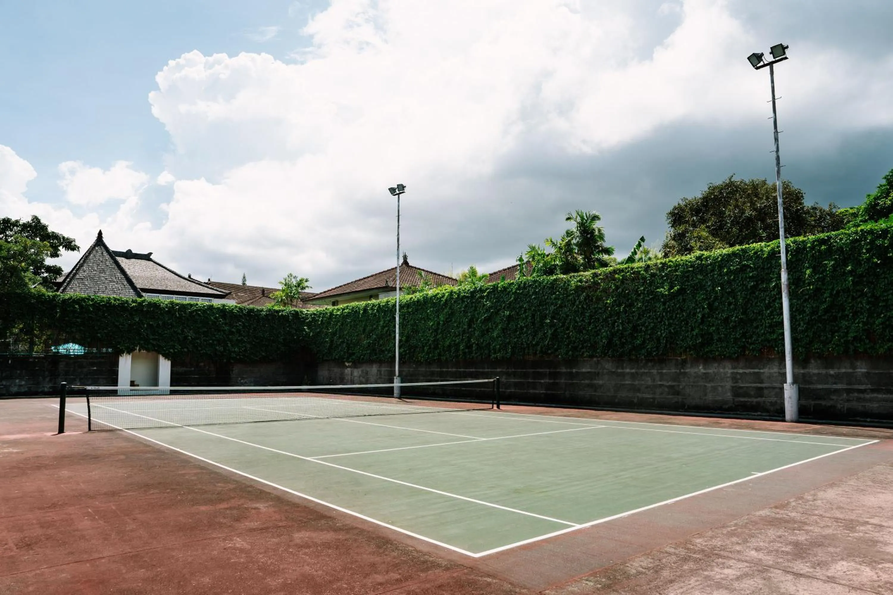 Tennis court in Rama Beach Resort and Villas