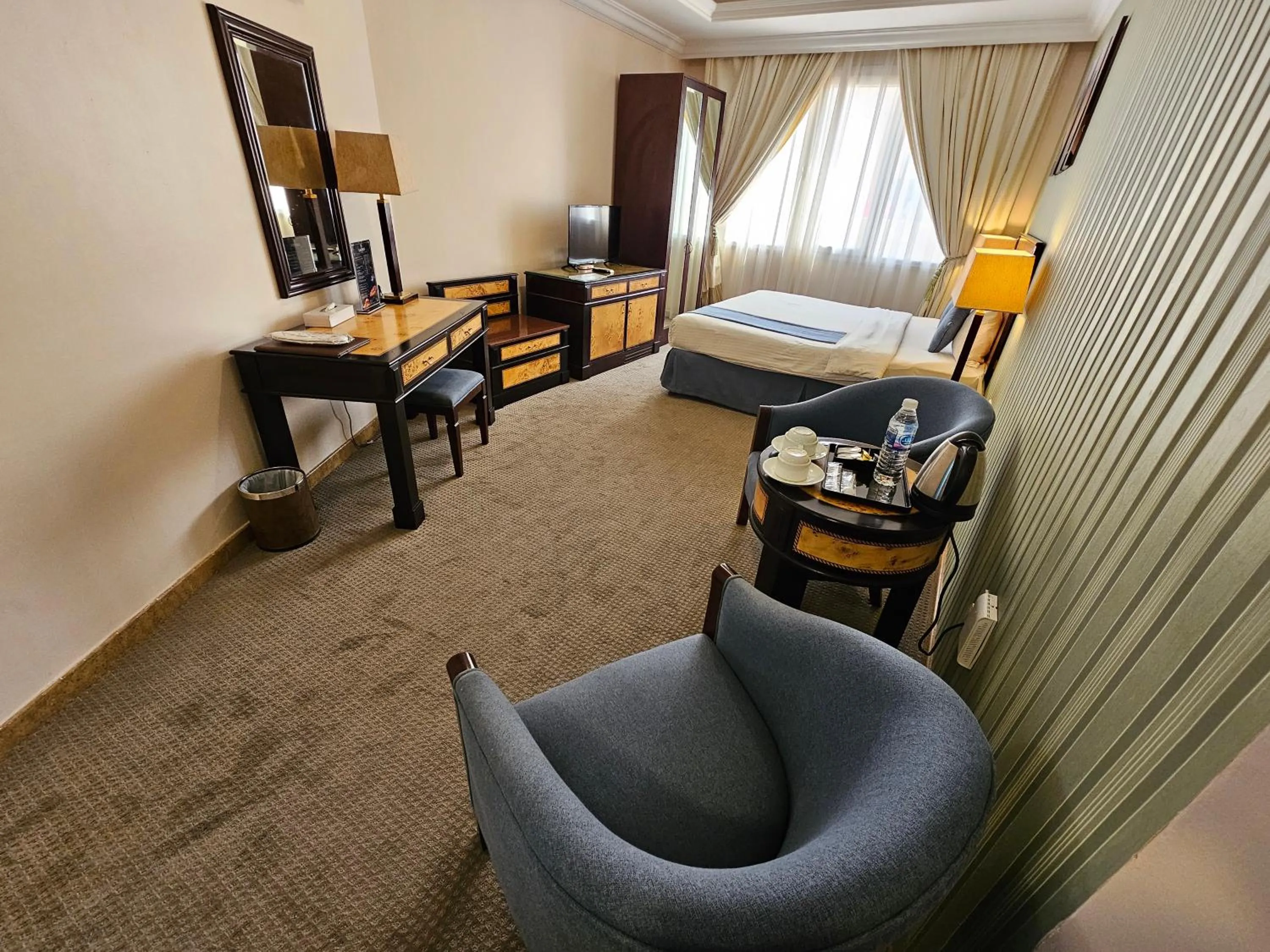 Seating area in Garden Hotel Muscat By Royal Titan Group