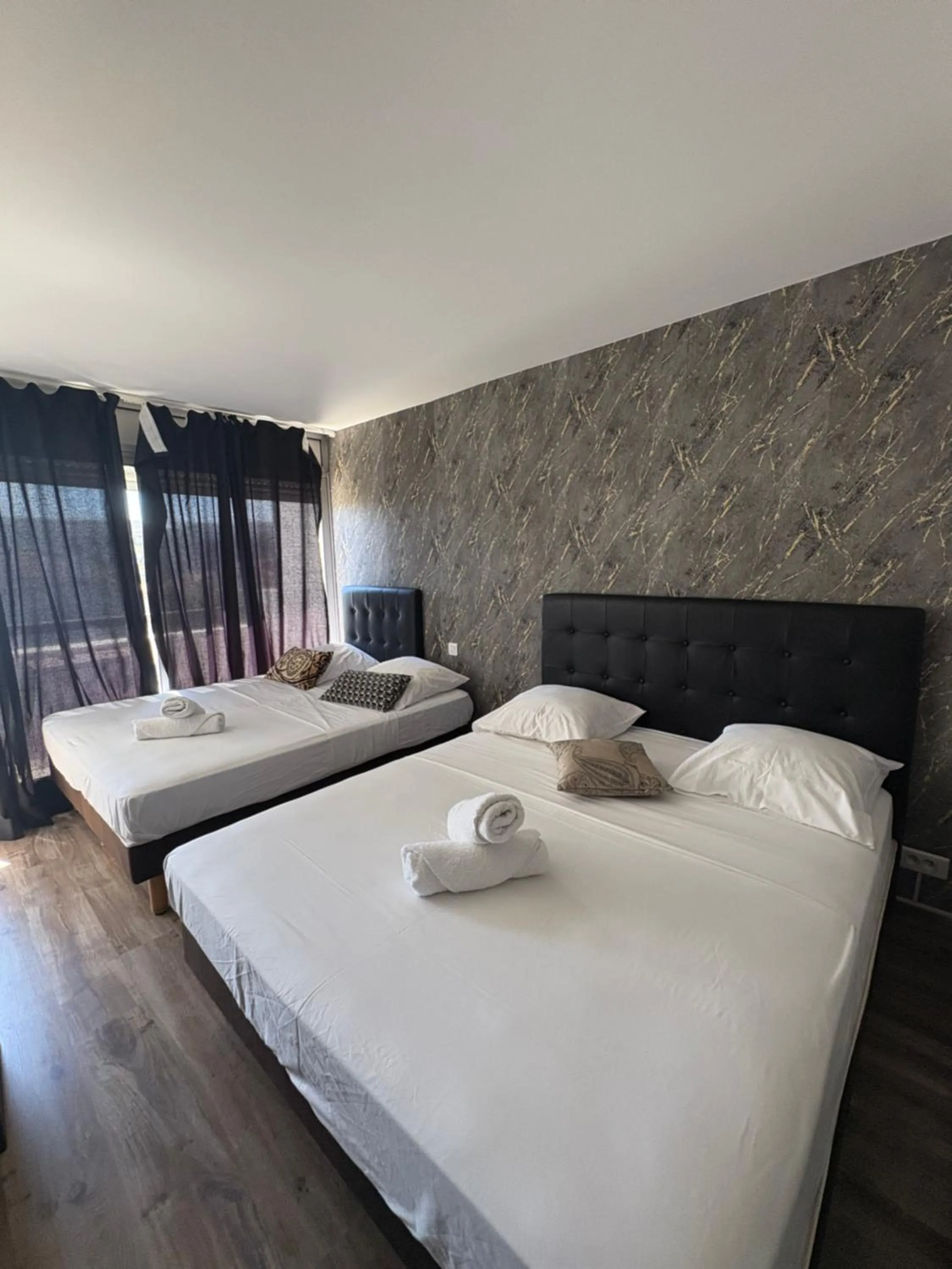 Bed in Hotel Sable Et Soleil - Port, Plage & Jacuzzi privé