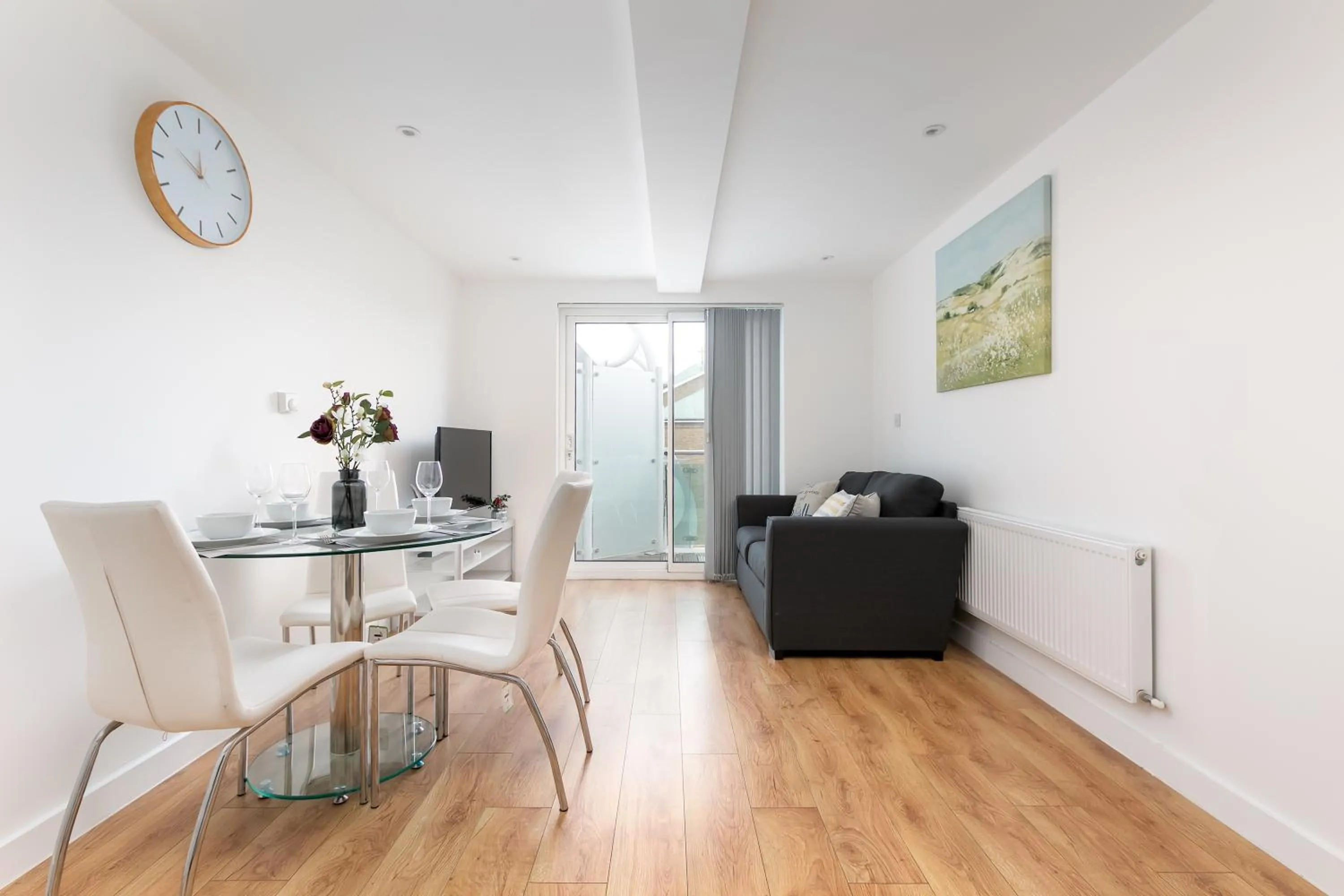 Living room in Skyvillion - COZY APARTMENTS in Enfield Town With Free Parking & Wifi