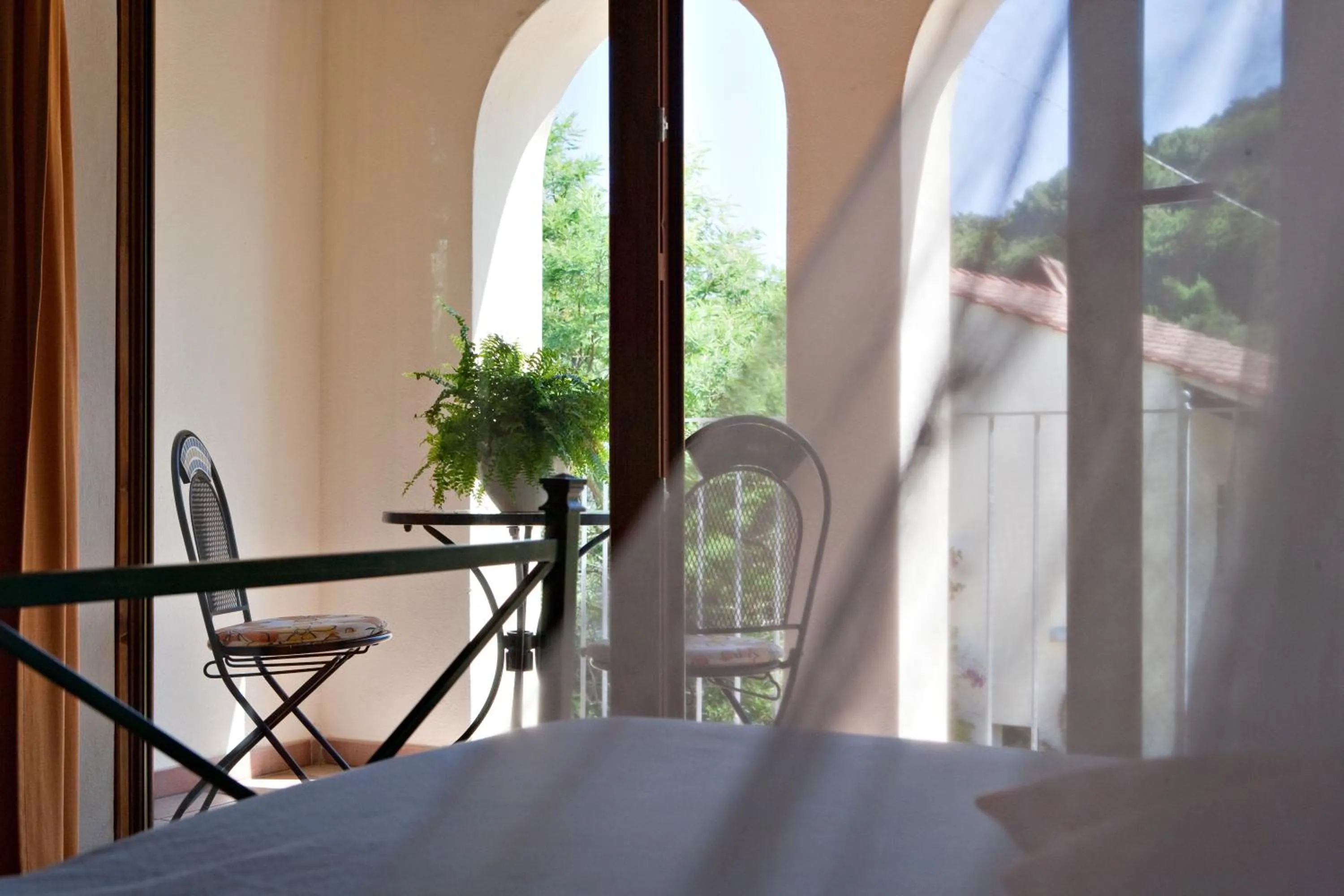 Balcony/Terrace, Bed in Hotel Santo Stefano
