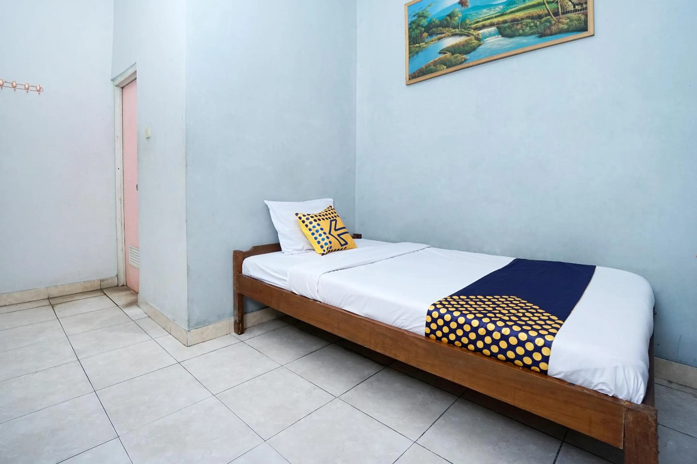 Bedroom in SPOT ON 2857 Hotel Pelangi