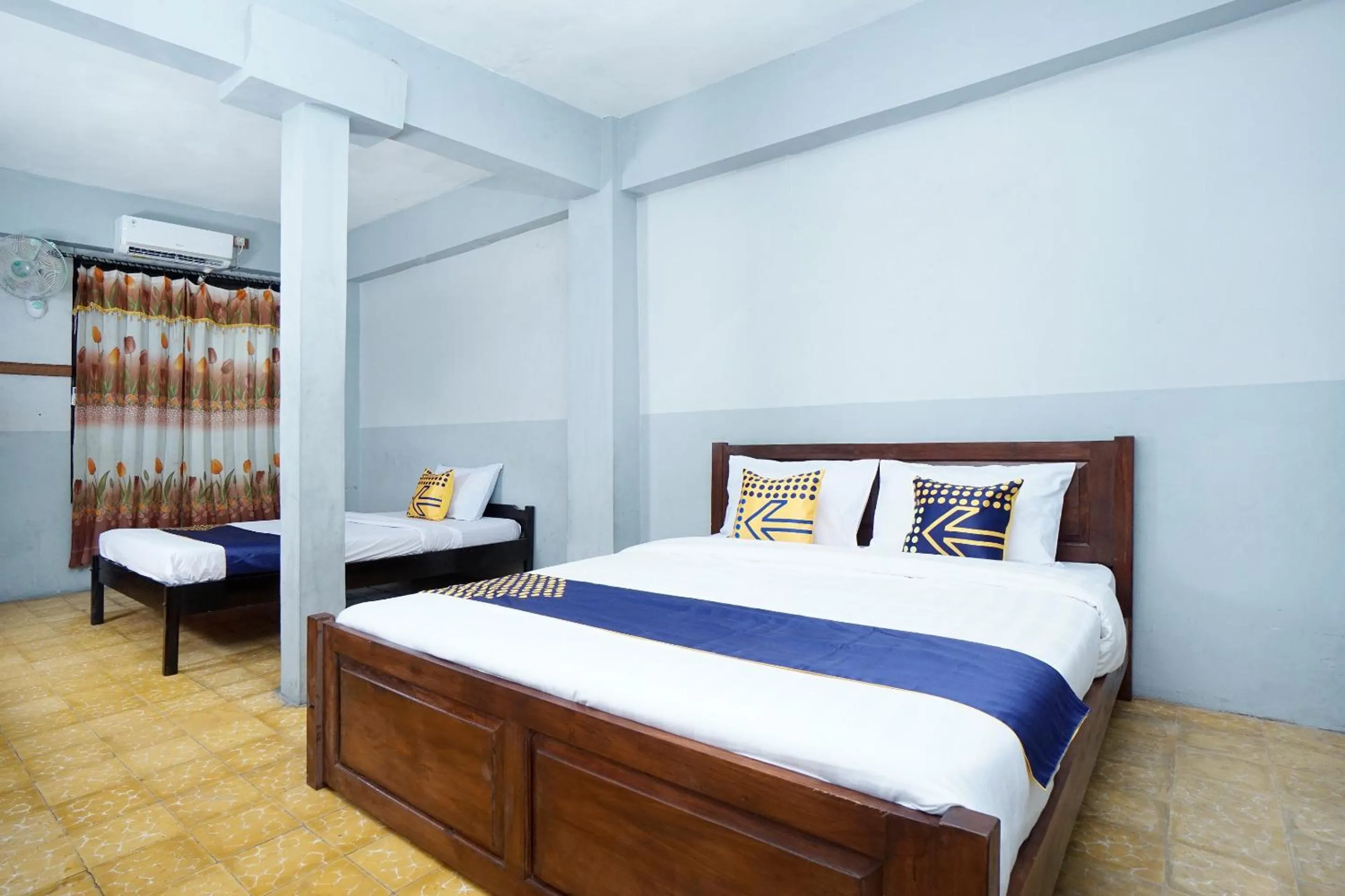 Bedroom in SPOT ON 2857 Hotel Pelangi