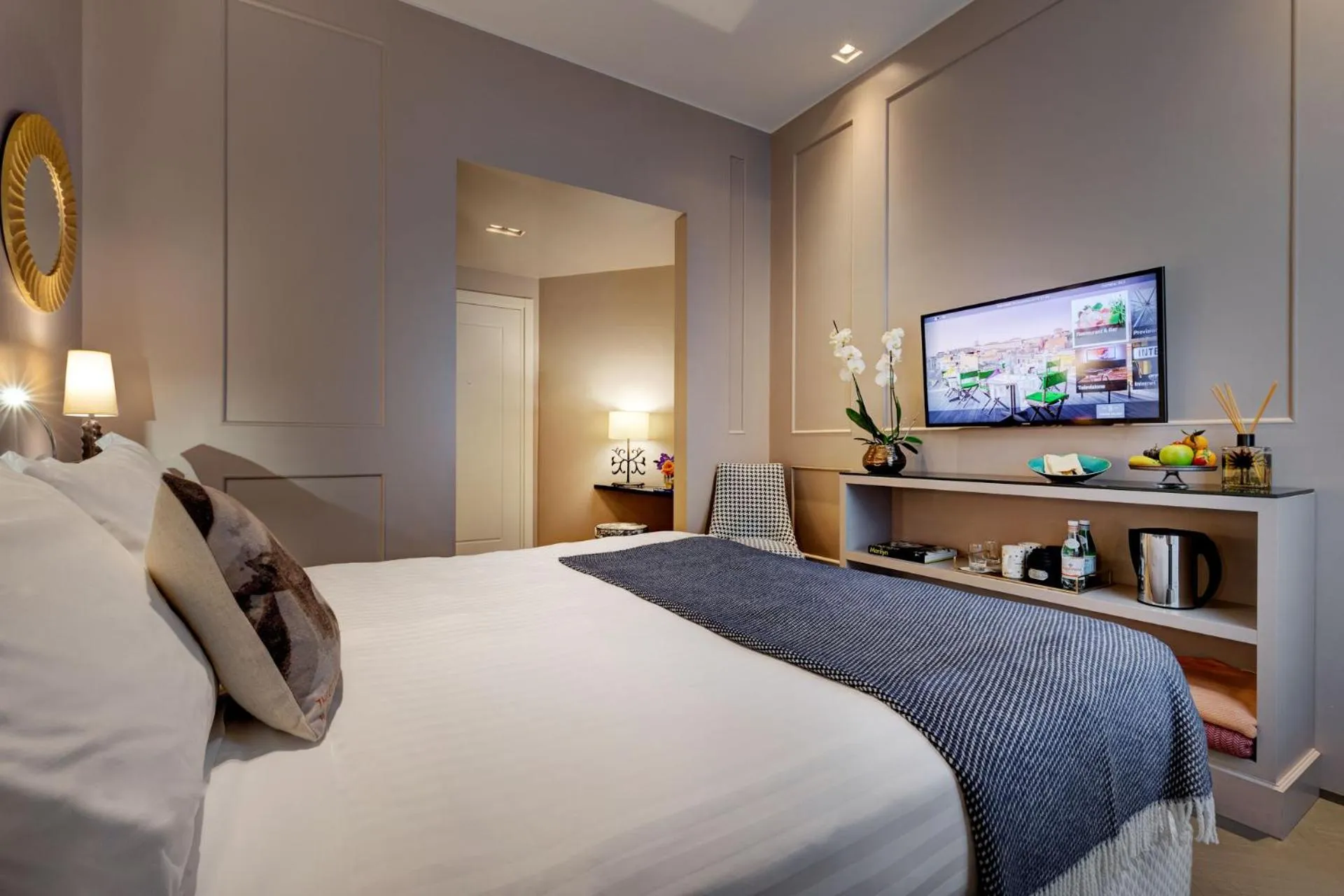 Bed in Singer Palace Hotel Roma