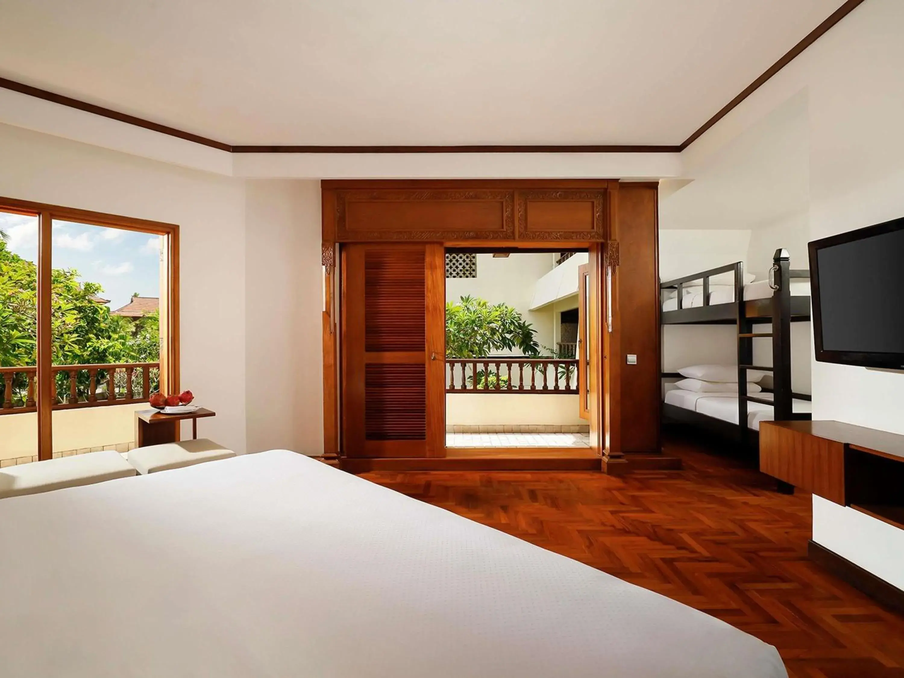 Family Room with One King Bed and One Bunk Bed in Nusa Dua Beach Hotel and Spa - Handwritten Collection Family Room with One King Bed and One Bunk Bed in Nusa Dua Beach Hotel and Spa - Handwritten Collection