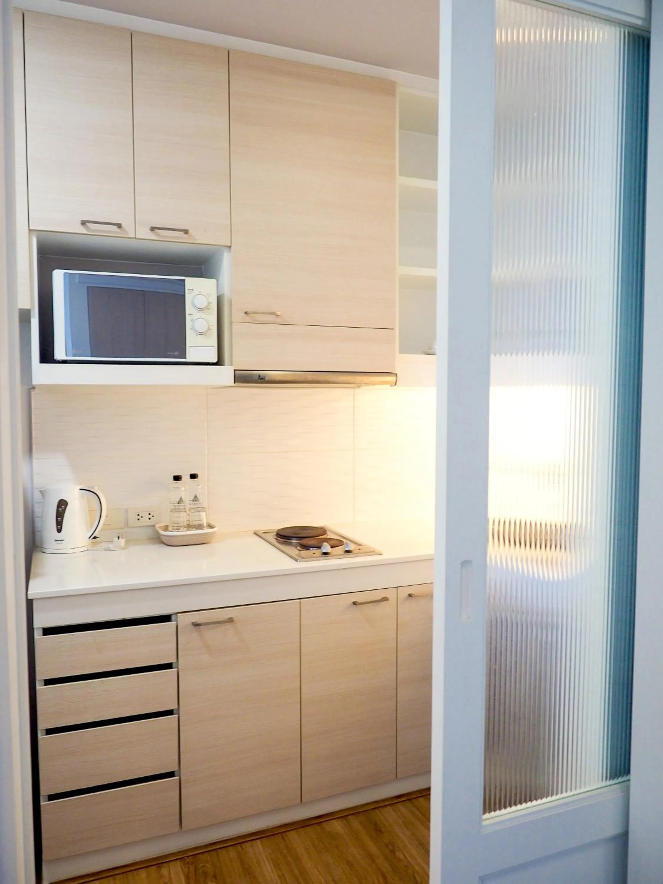 Kitchen or kitchenette in THE KANNAS Hotel & Serviced Apartment, Chiang Mai SHA Certified
