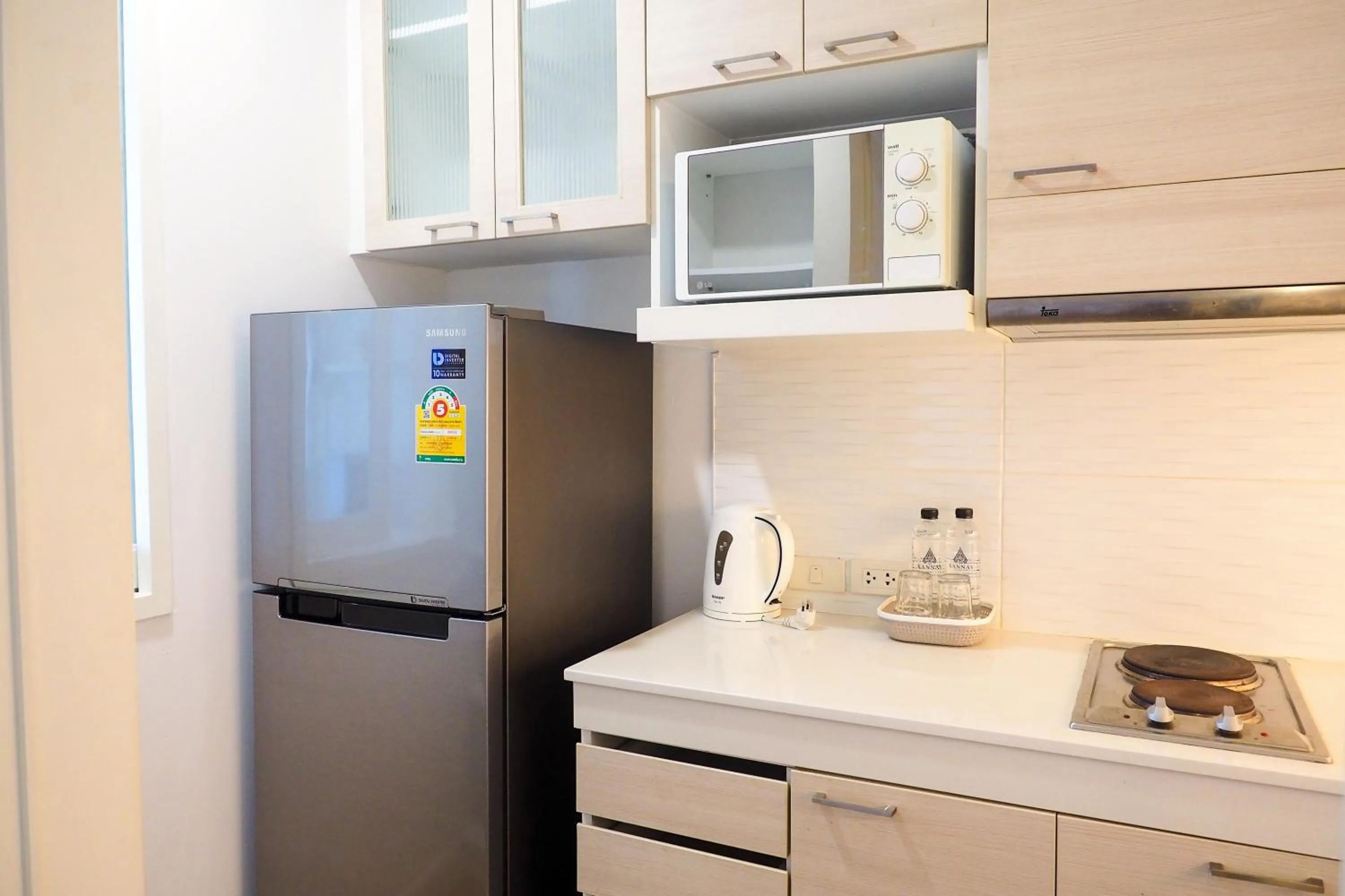Kitchen or kitchenette in THE KANNAS Hotel & Serviced Apartment, Chiang Mai SHA Certified