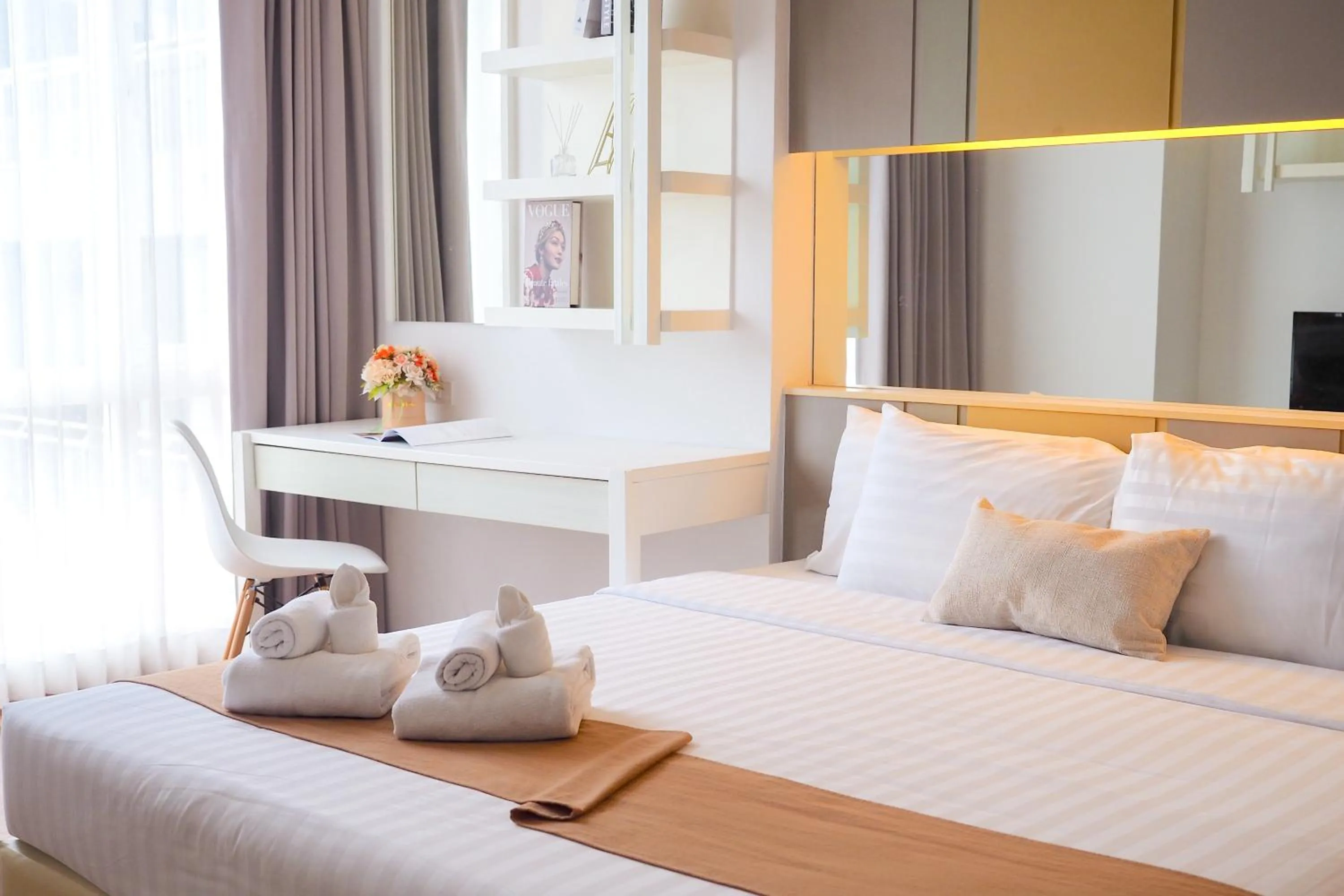 Bed in THE KANNAS Hotel & Serviced Apartment, Chiang Mai SHA Certified