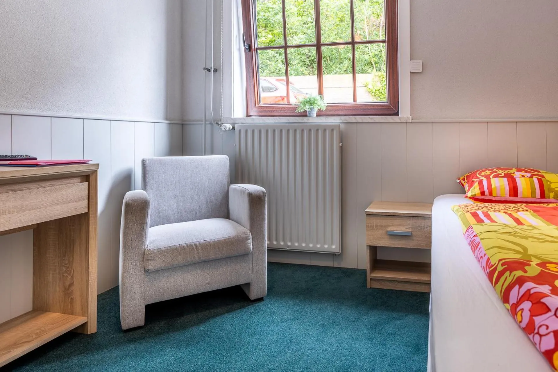 Seating area, Bed in B&B Rehoboth