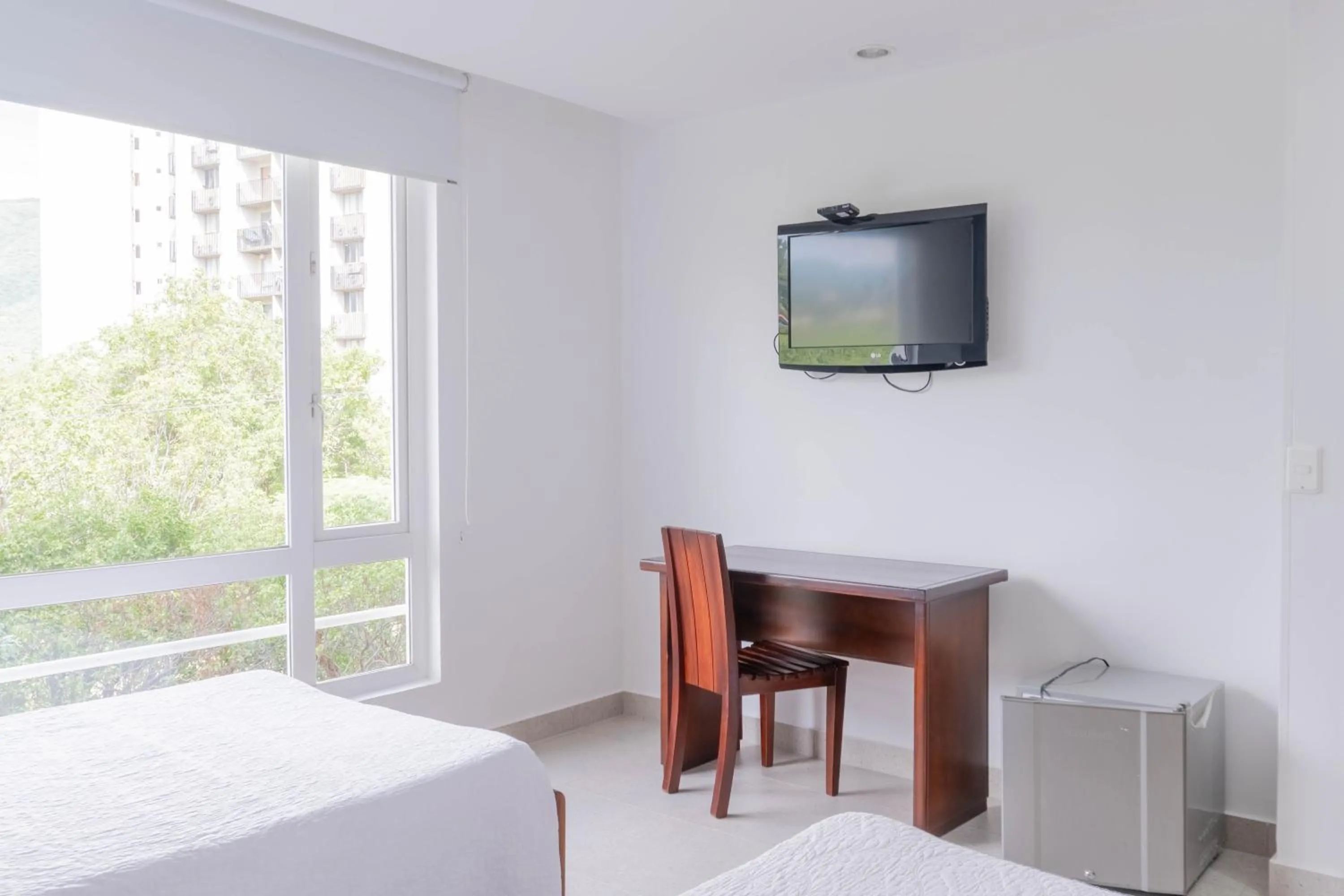 Photo of the whole room, Bed in Sanha Plus Hotel