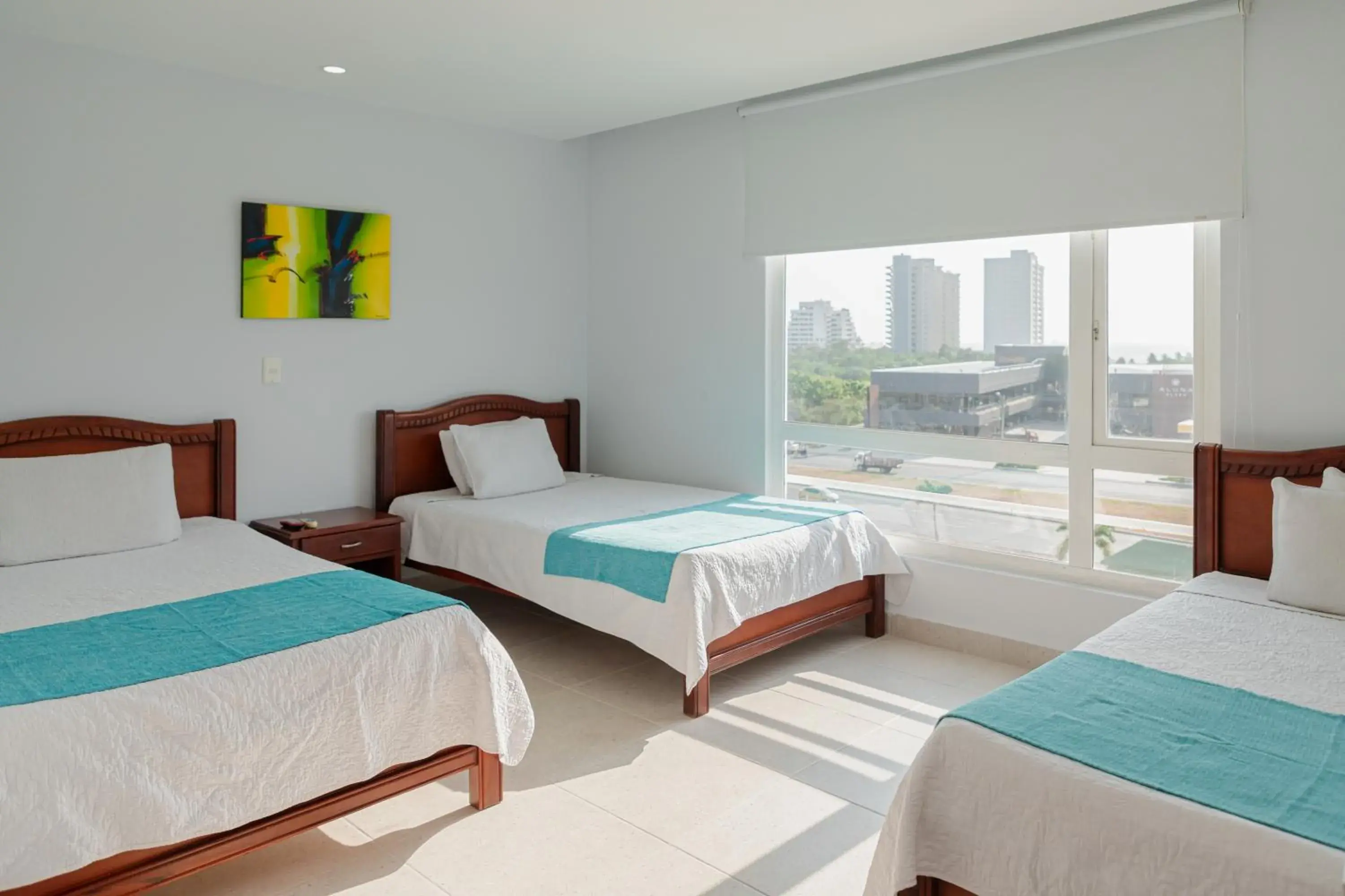 Standard Triple Room in Sanha Plus Hotel Standard Triple Room in Sanha Plus Hotel