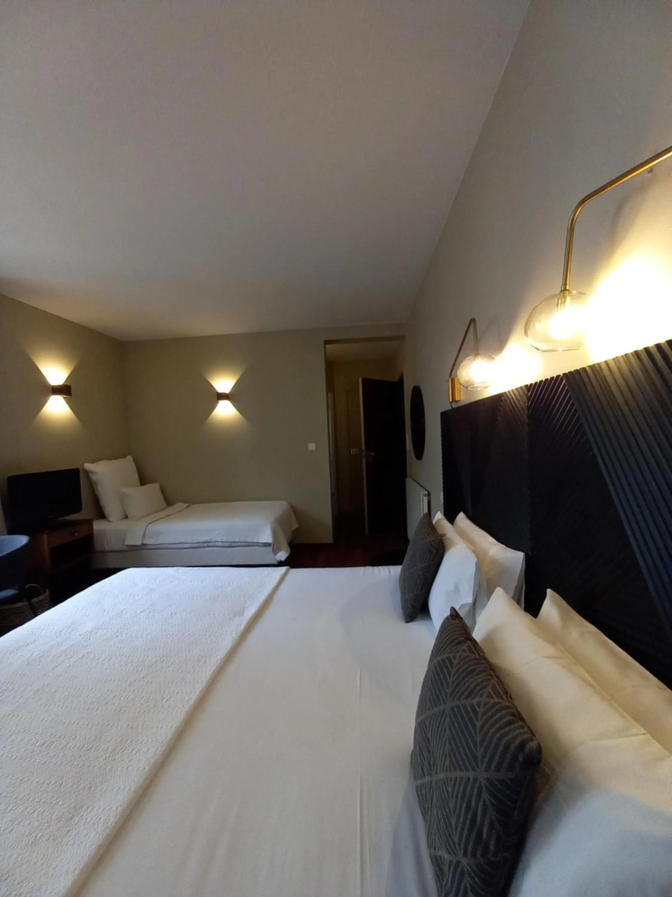 Bed in Hôtel La Caravelle