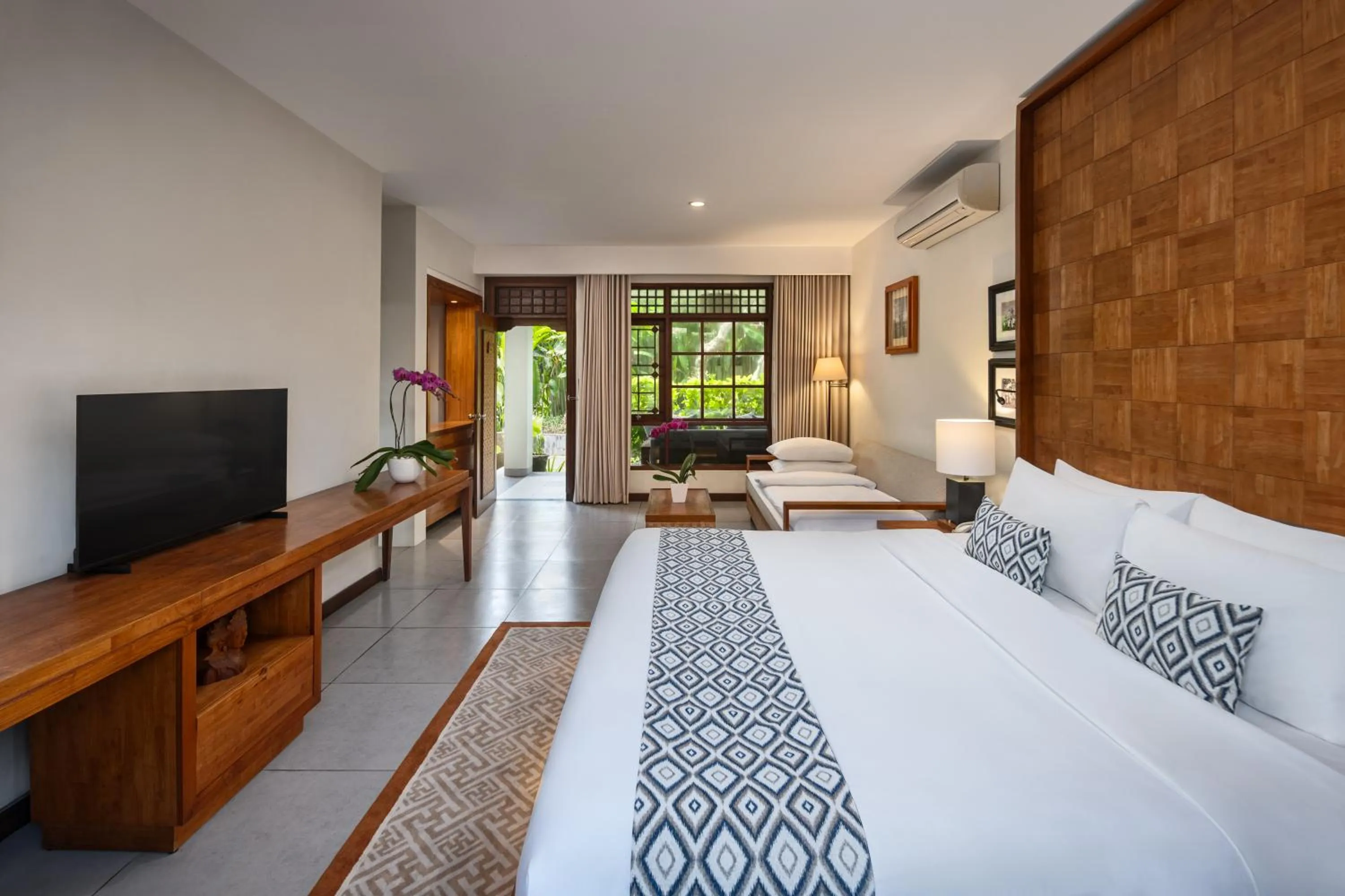 Bed in Ramayana Candidasa Beach Resort