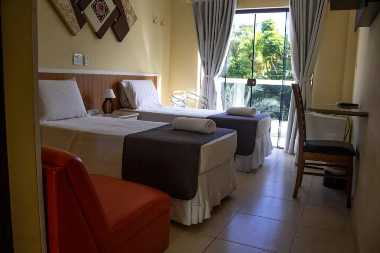 Bed in Charme Hotel Guarujá Frente Mar