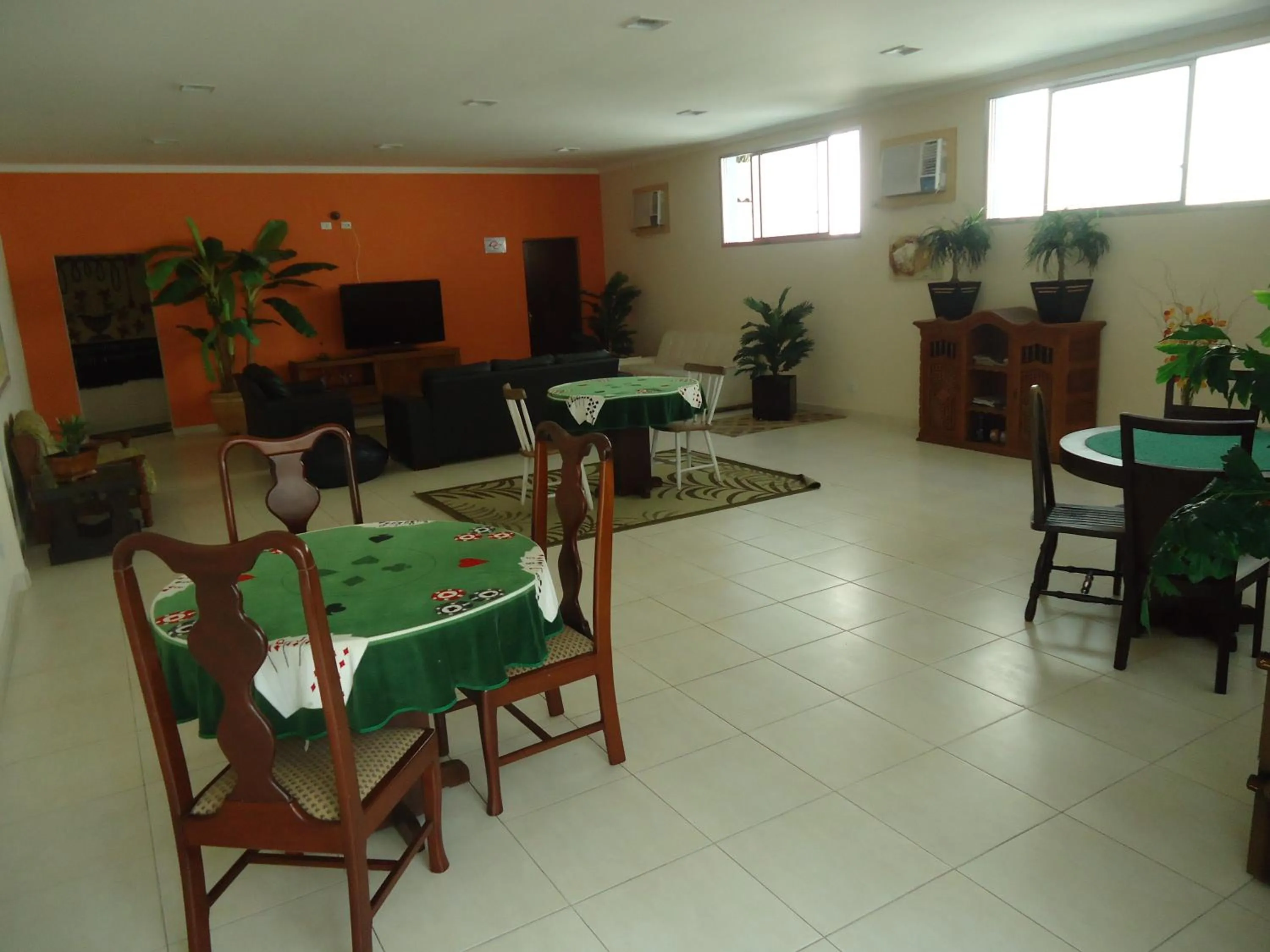 Communal lounge/ TV room in Charme Hotel Guarujá Frente Mar