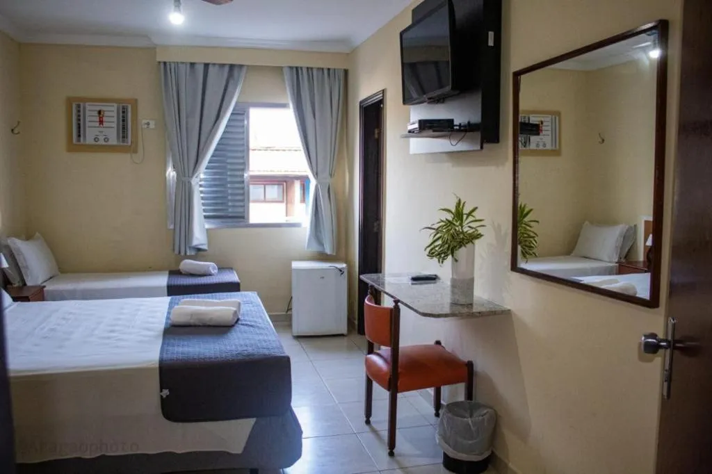 Bed in Charme Hotel Guarujá Frente Mar