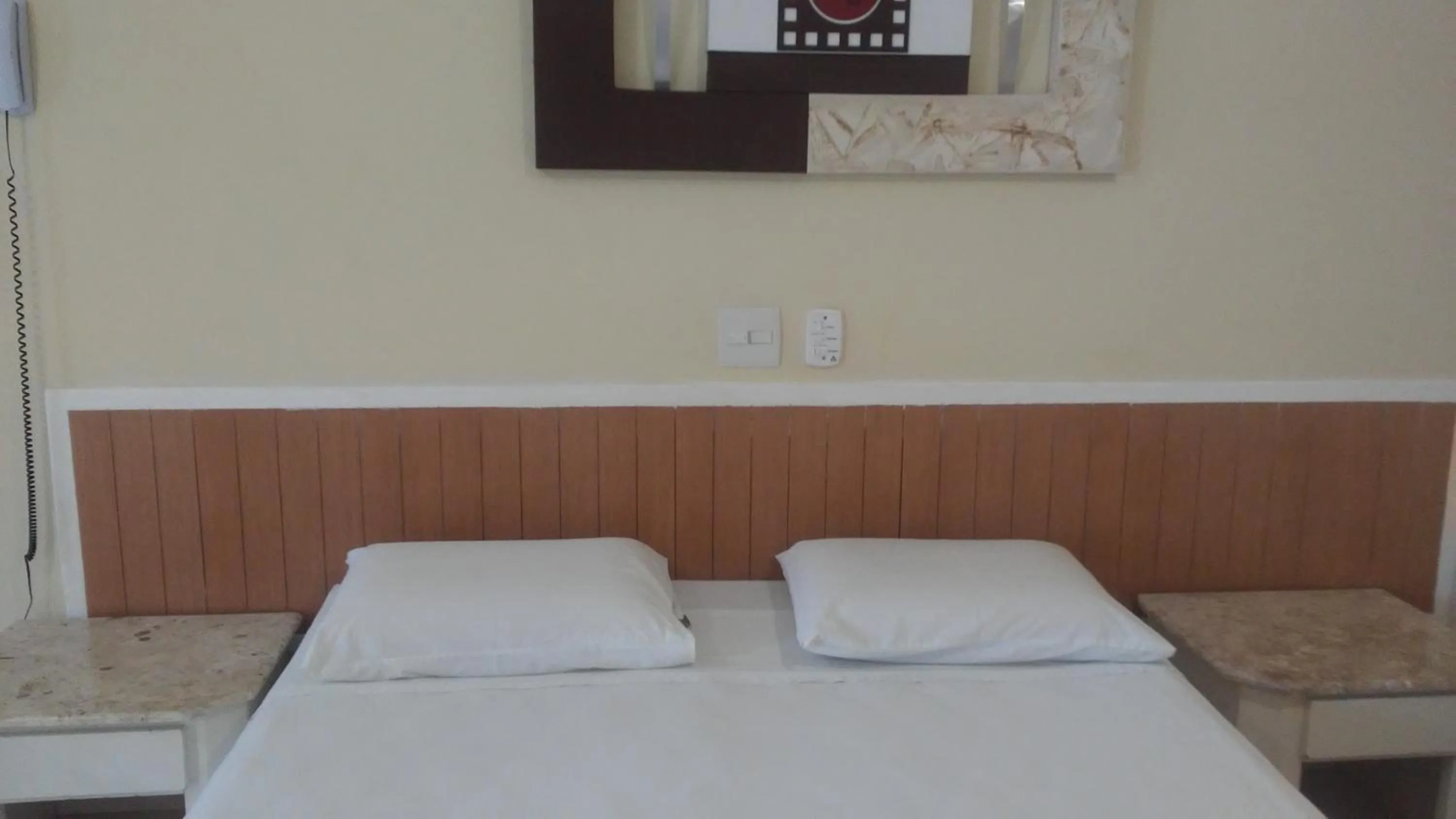 Bed in Charme Hotel Guarujá Frente Mar