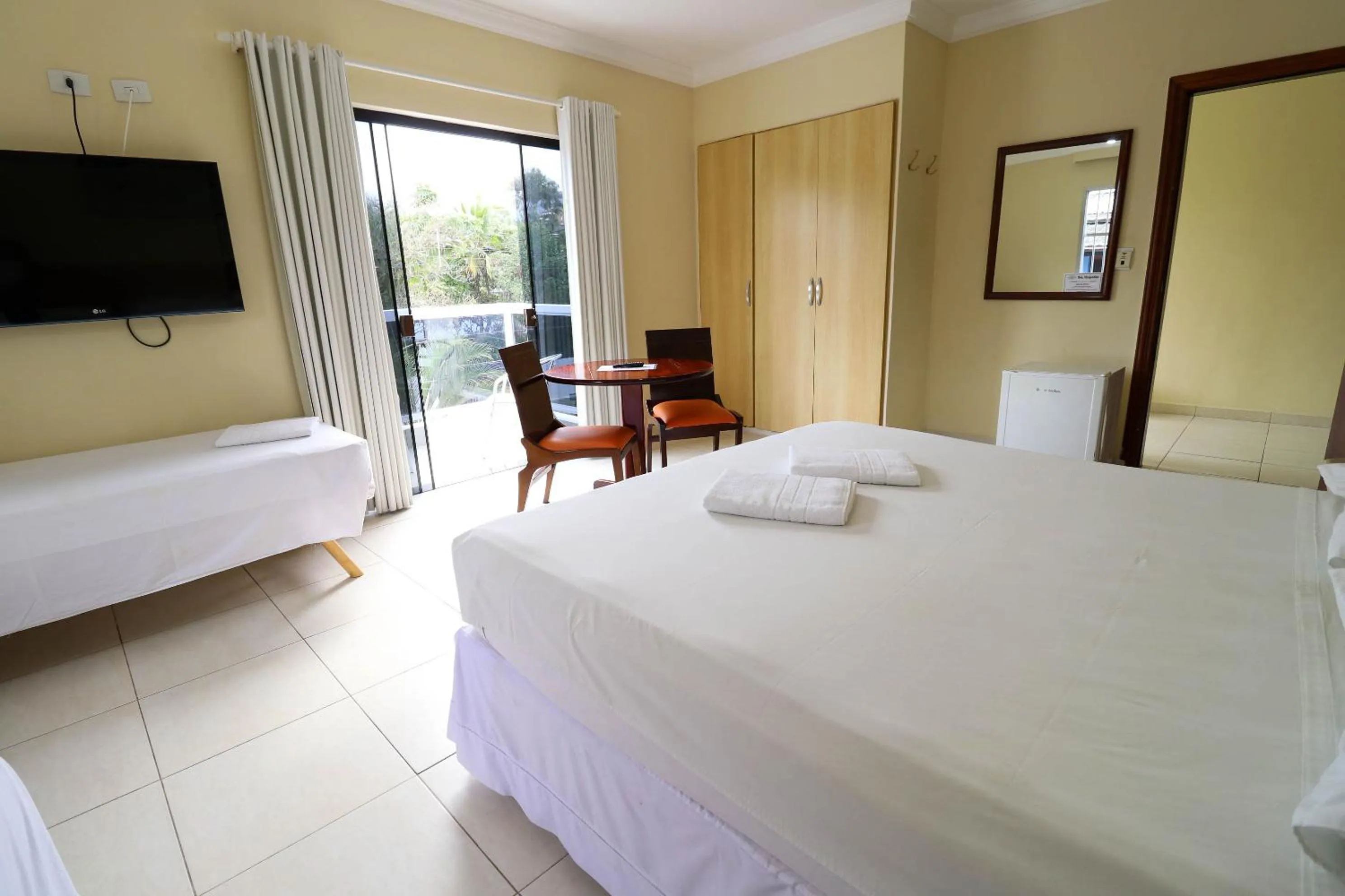 Bed in Charme Hotel Guarujá Frente Mar