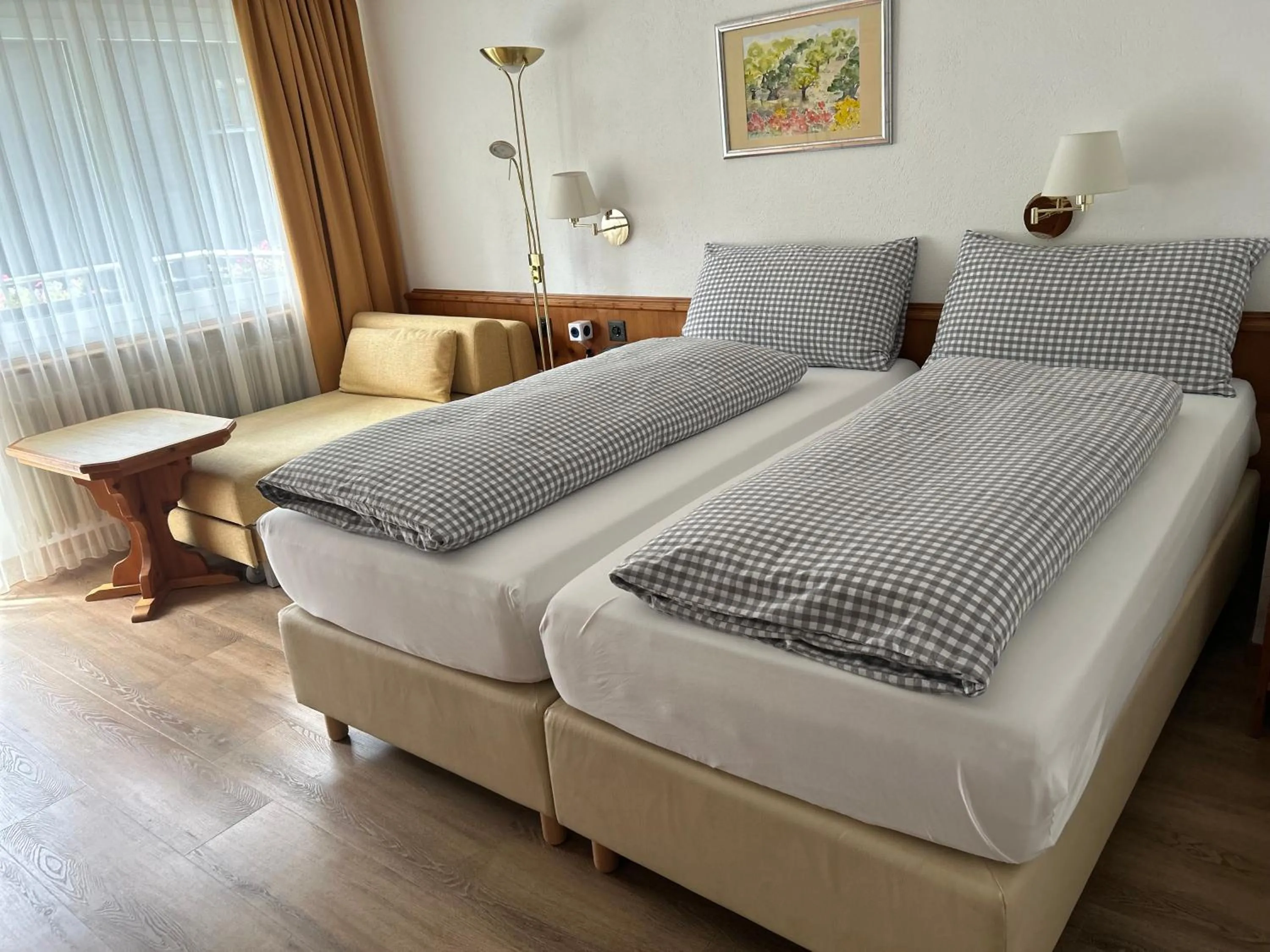 Seating area, Bed in Hotel Adonis