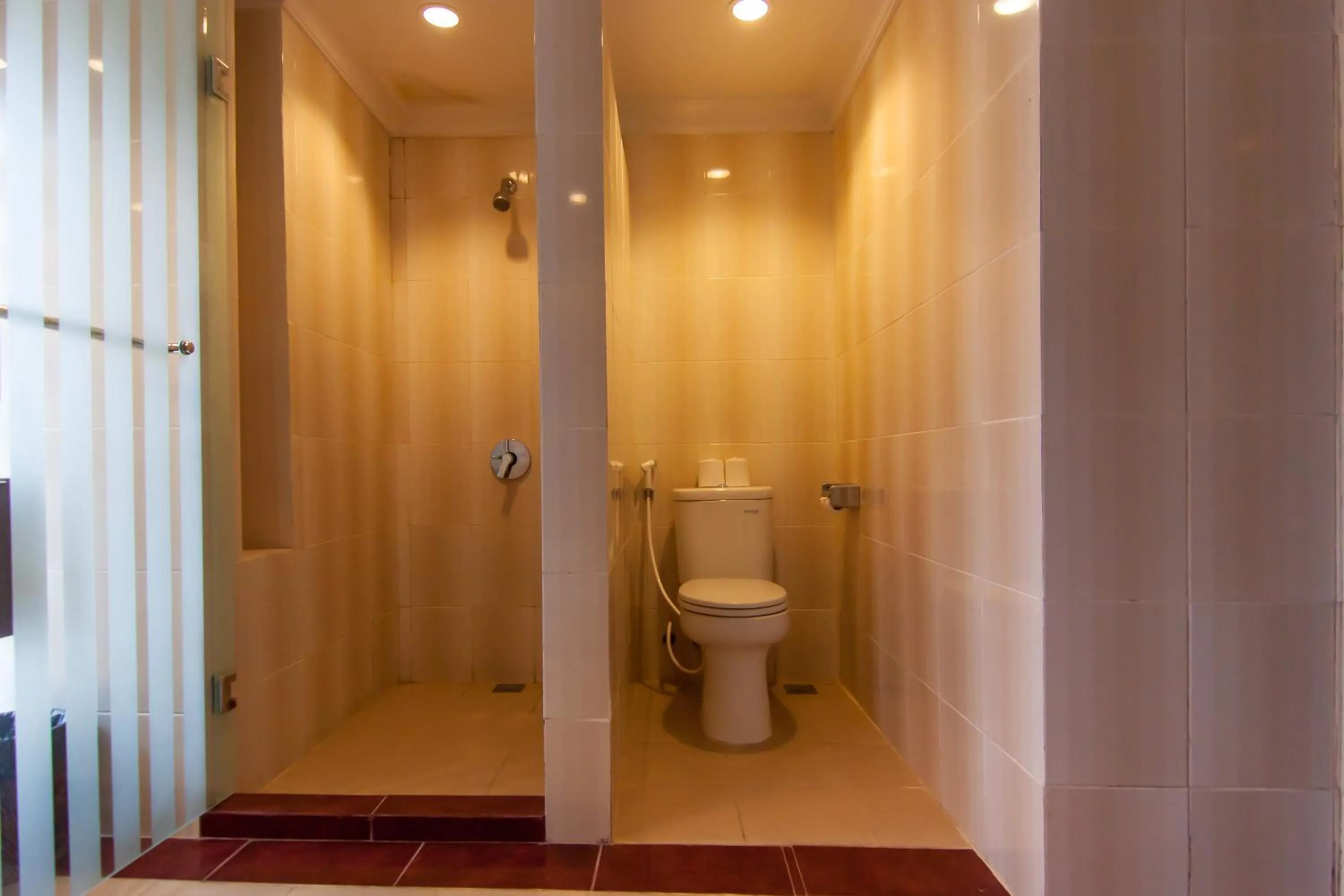 Bathroom in Champlung Mas Hotel Legian