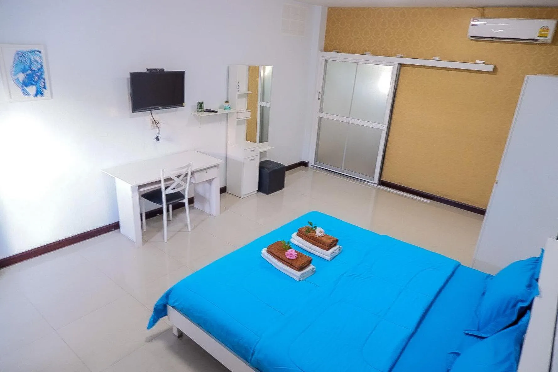 Bed in Ruen Aiyara Apartment