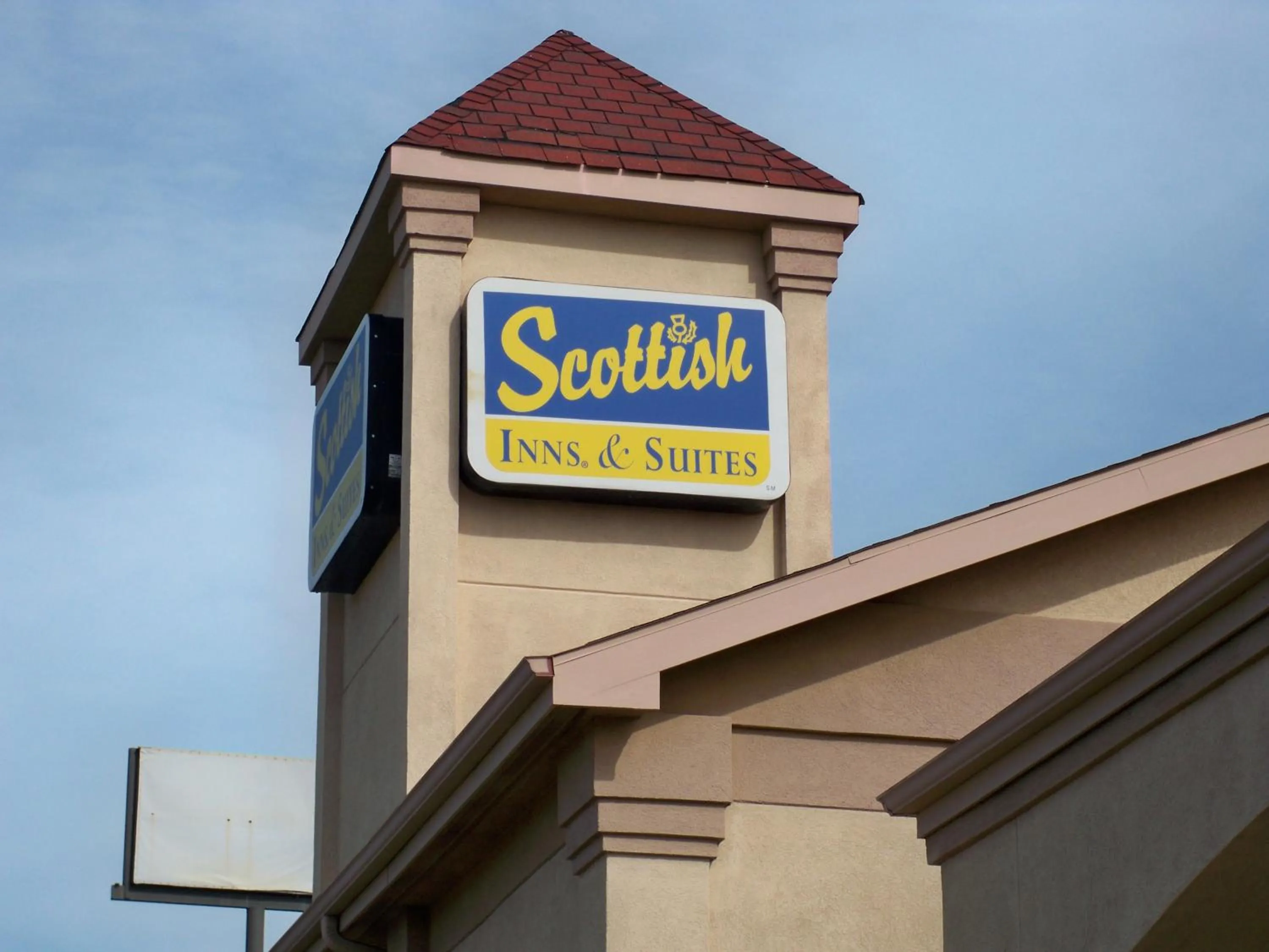 Property logo or sign in Scottish Inn and Suites Beaumont