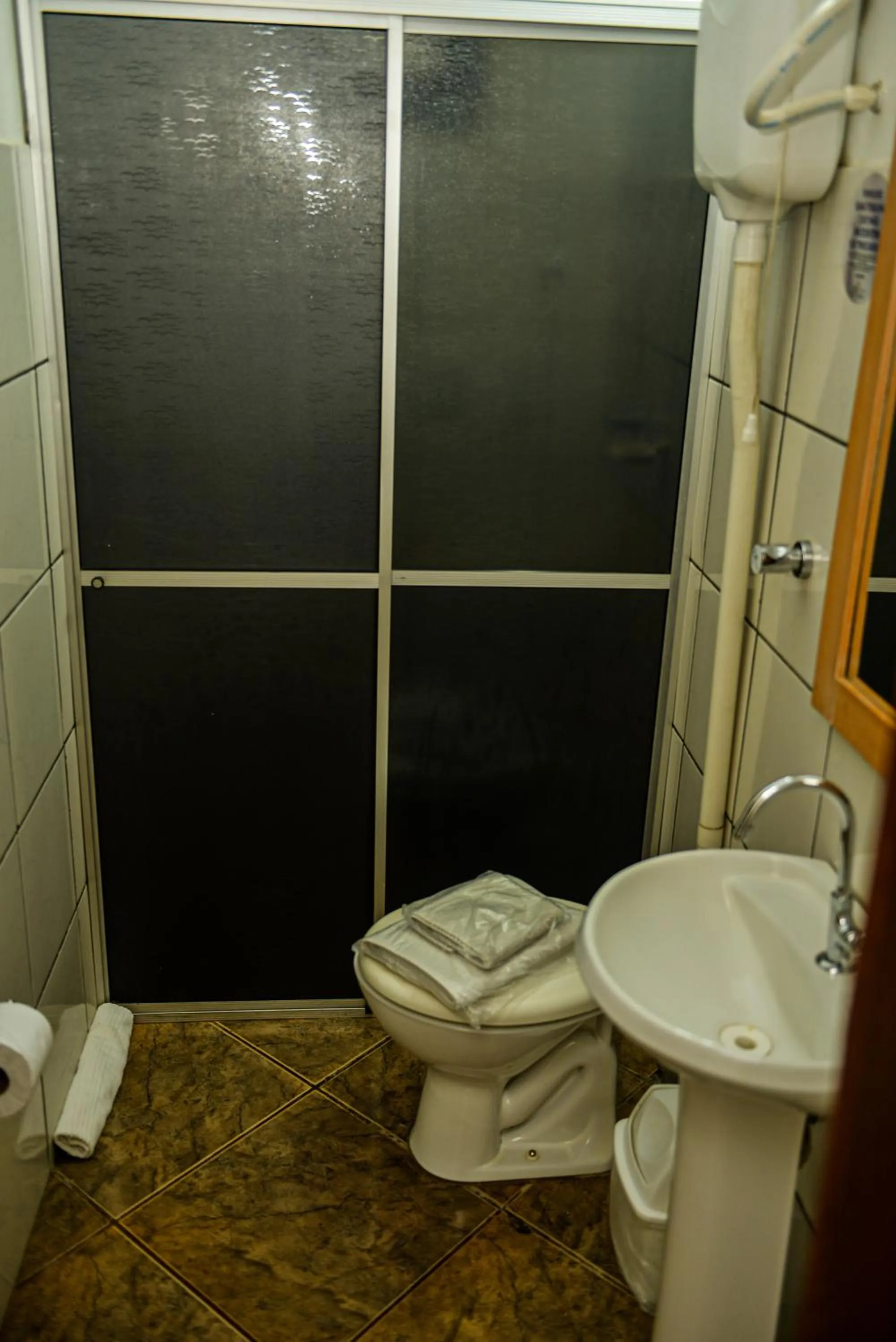 Bathroom in Hotel D'Nápoles