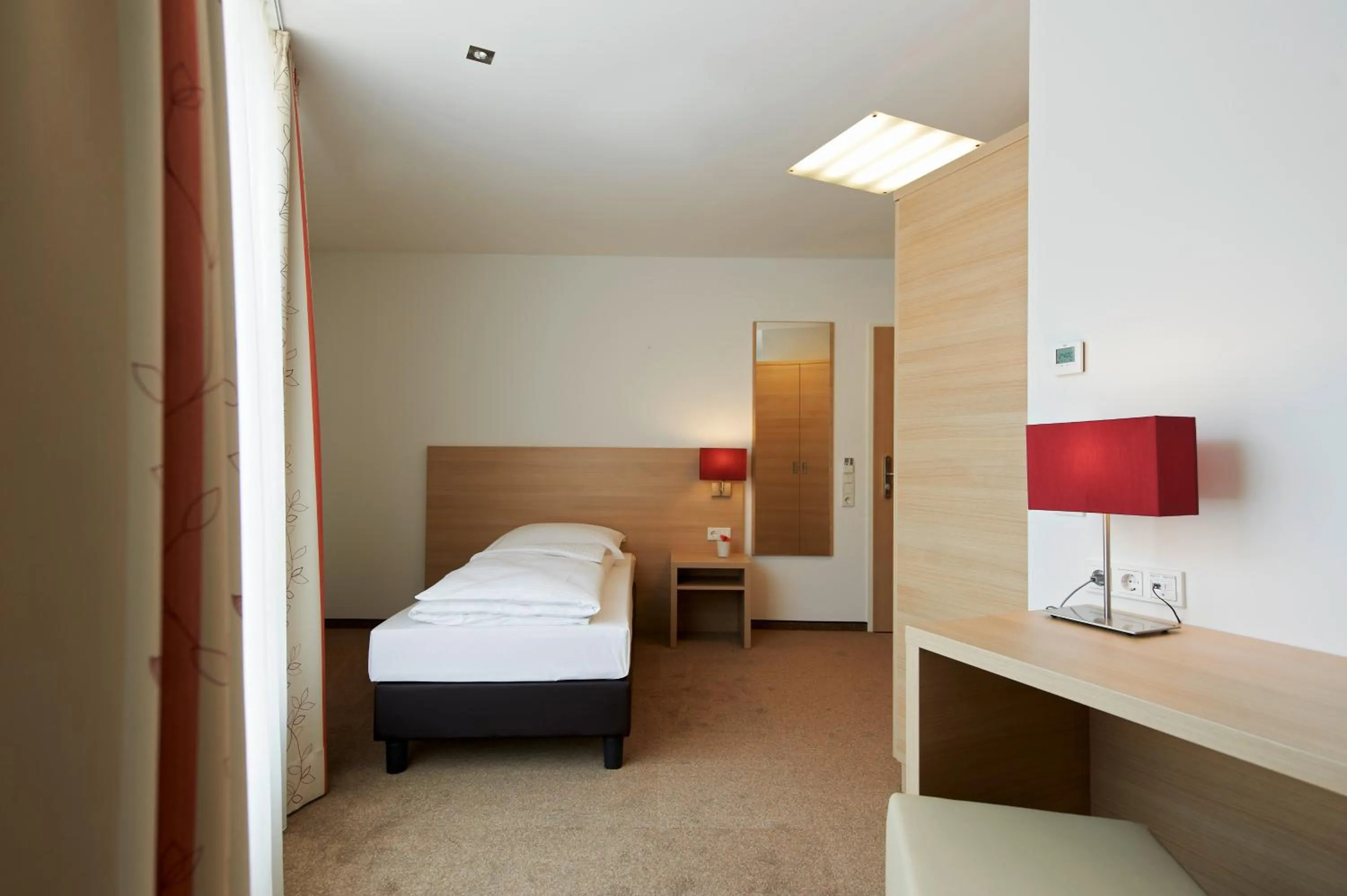 Photo of the whole room, Bed in Sternen Hotel Wolfurt