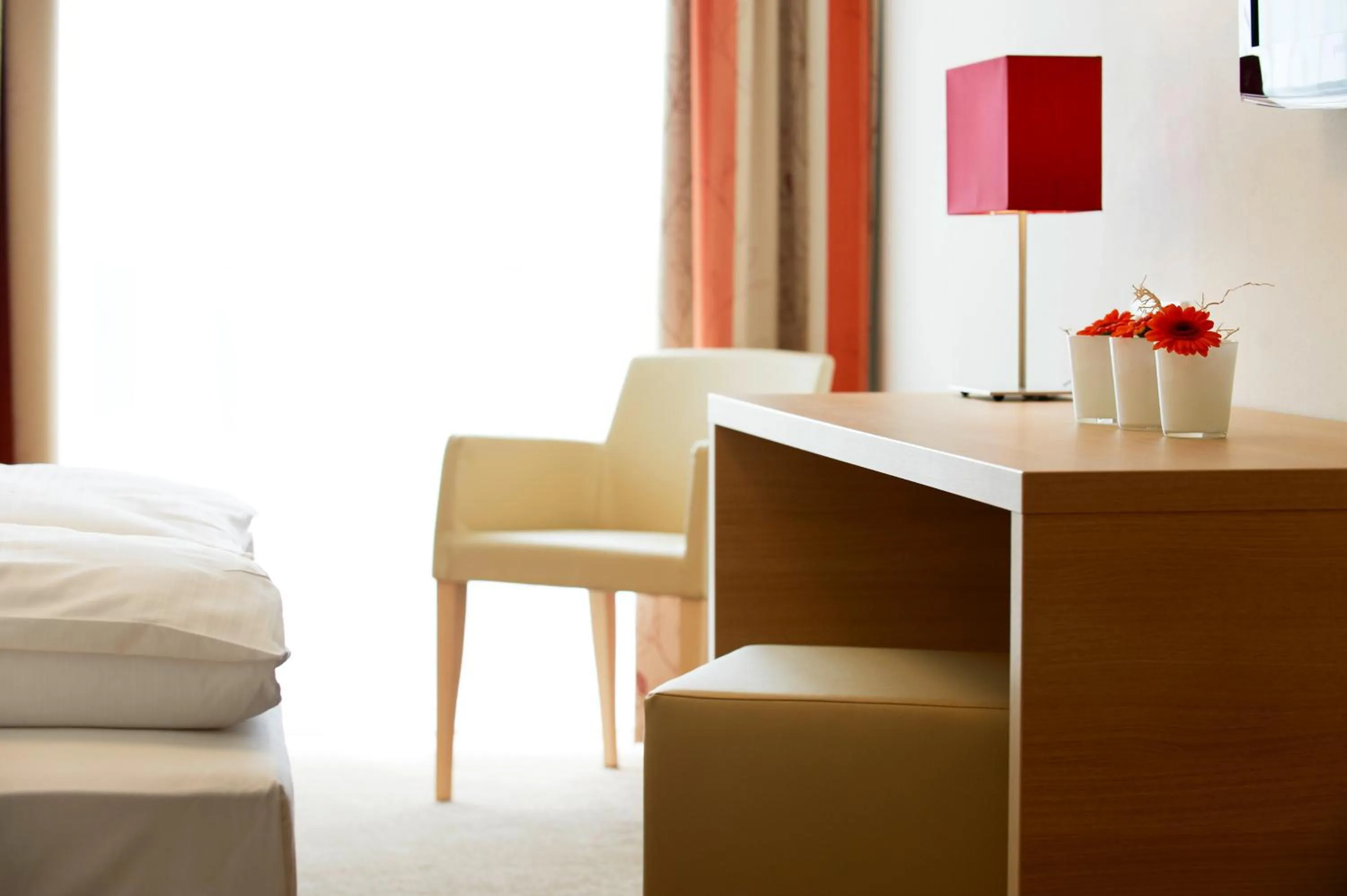 Seating area, Bed in Sternen Hotel Wolfurt