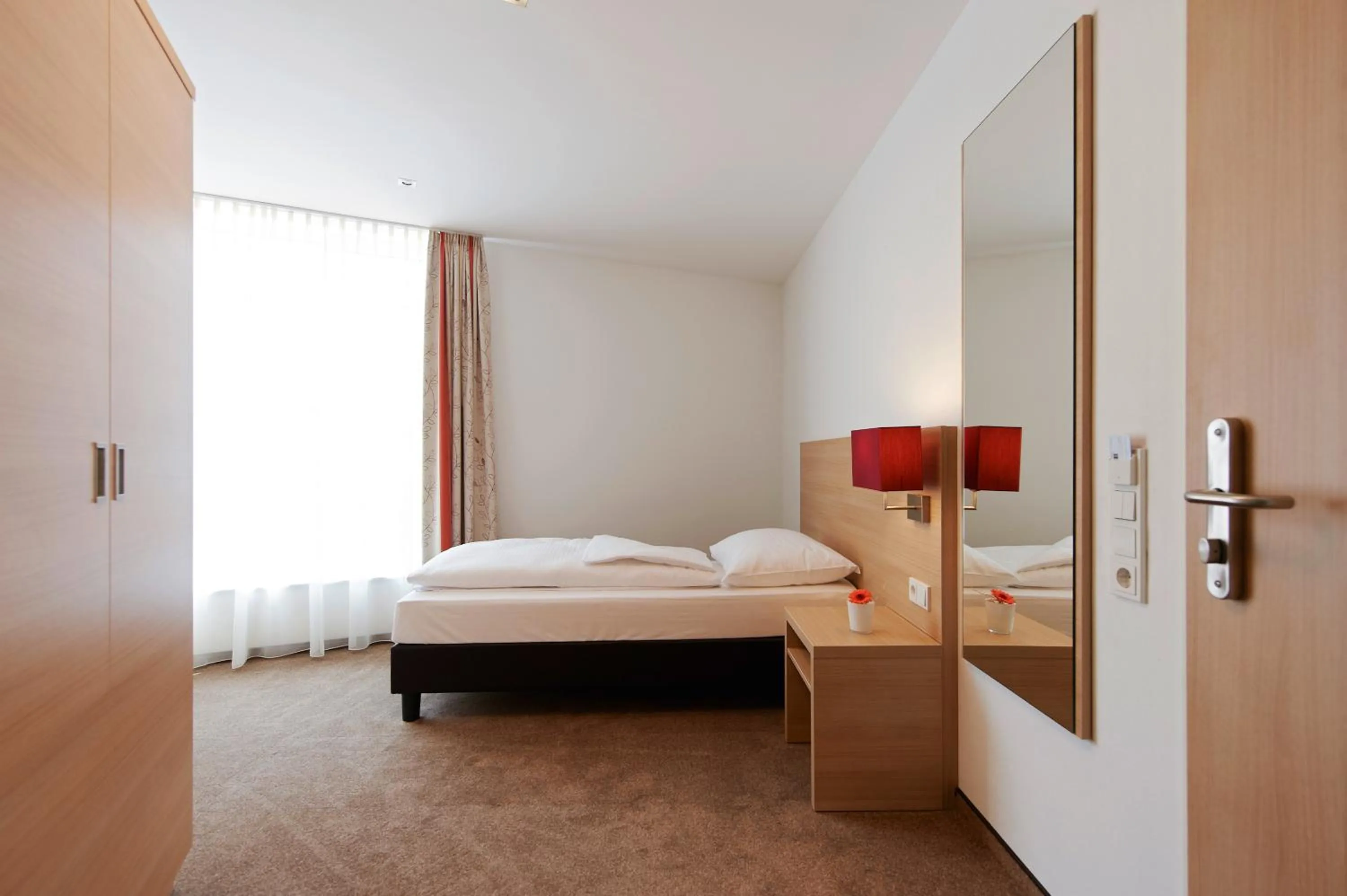 Photo of the whole room, Bed in Sternen Hotel Wolfurt