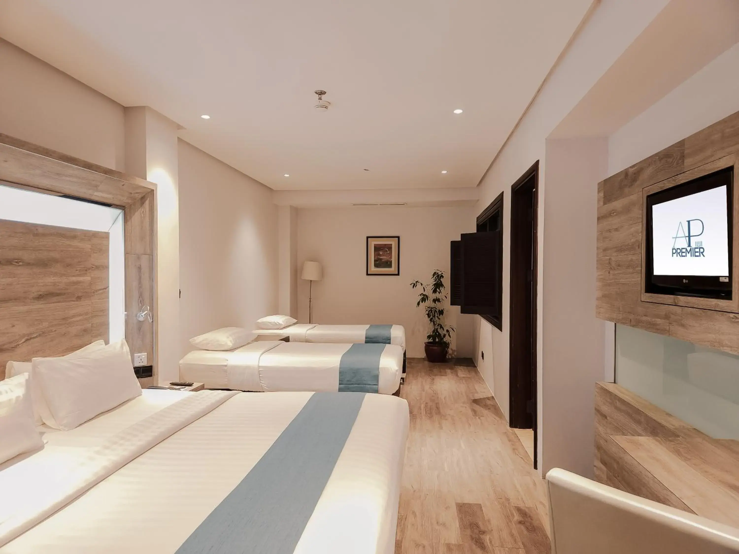 Quadruple Room in AP Premier Batam Quadruple Room in AP Premier Batam