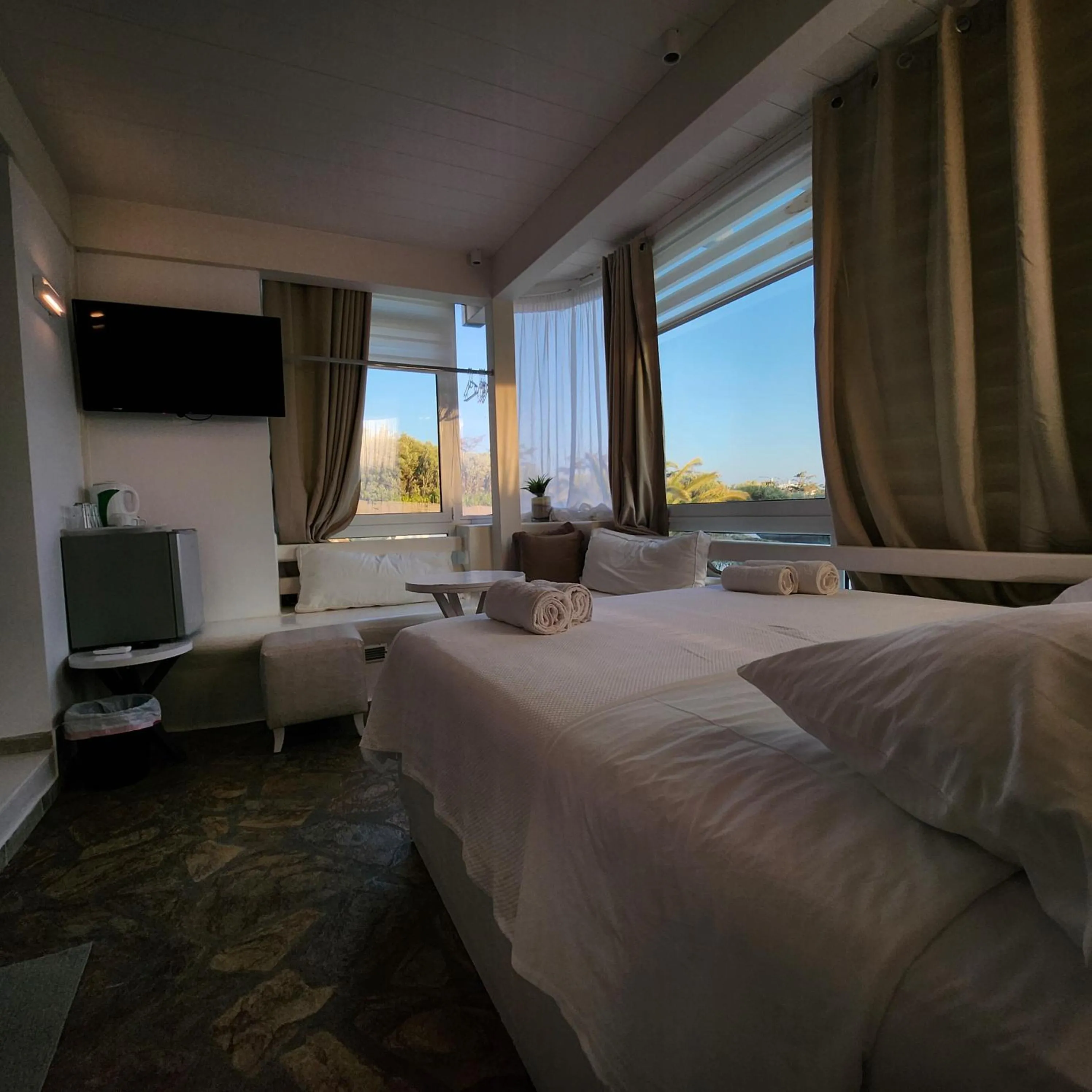 Bed in Mykonian Iros Suites & Villas