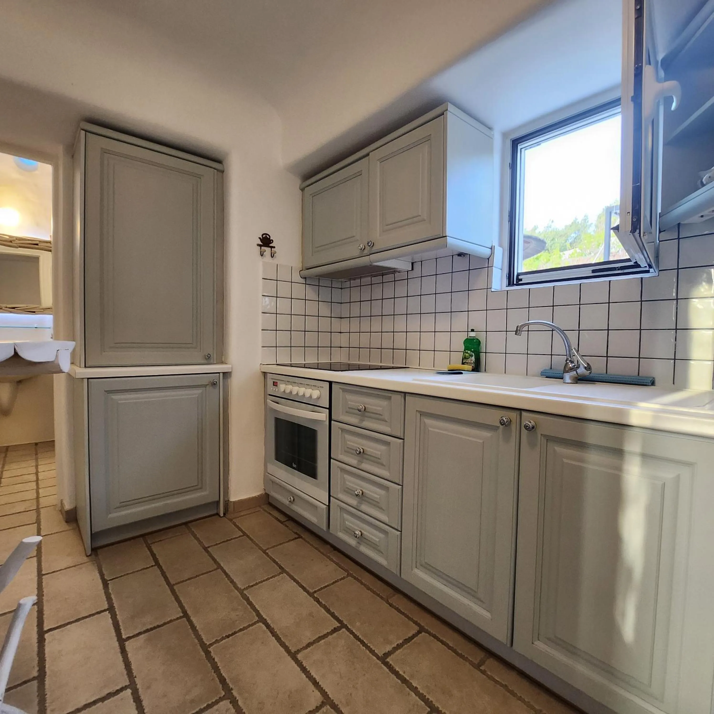 Kitchen or kitchenette in Mykonian Iros Suites & Villas