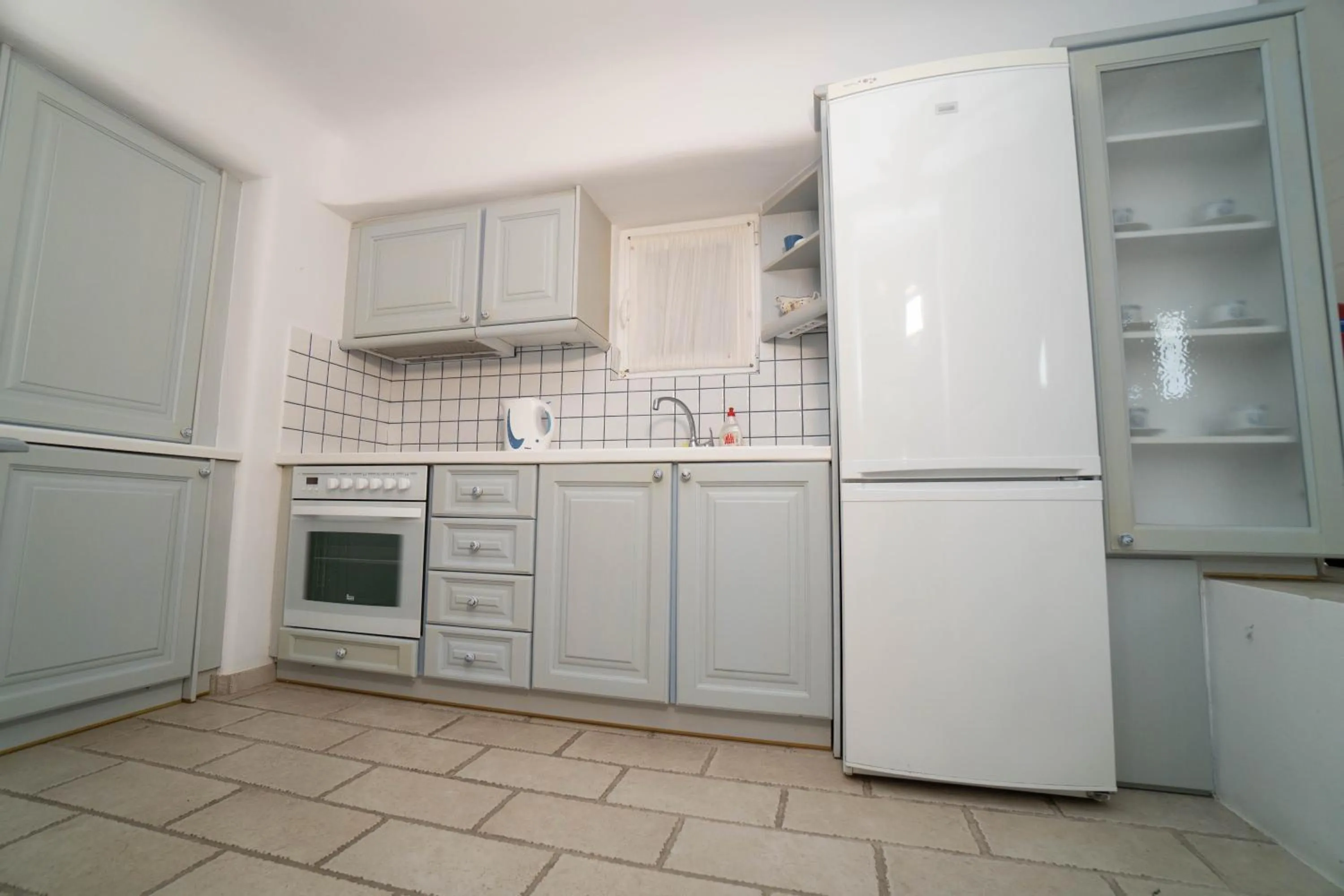 Kitchen or kitchenette in Mykonian Iros Suites & Villas