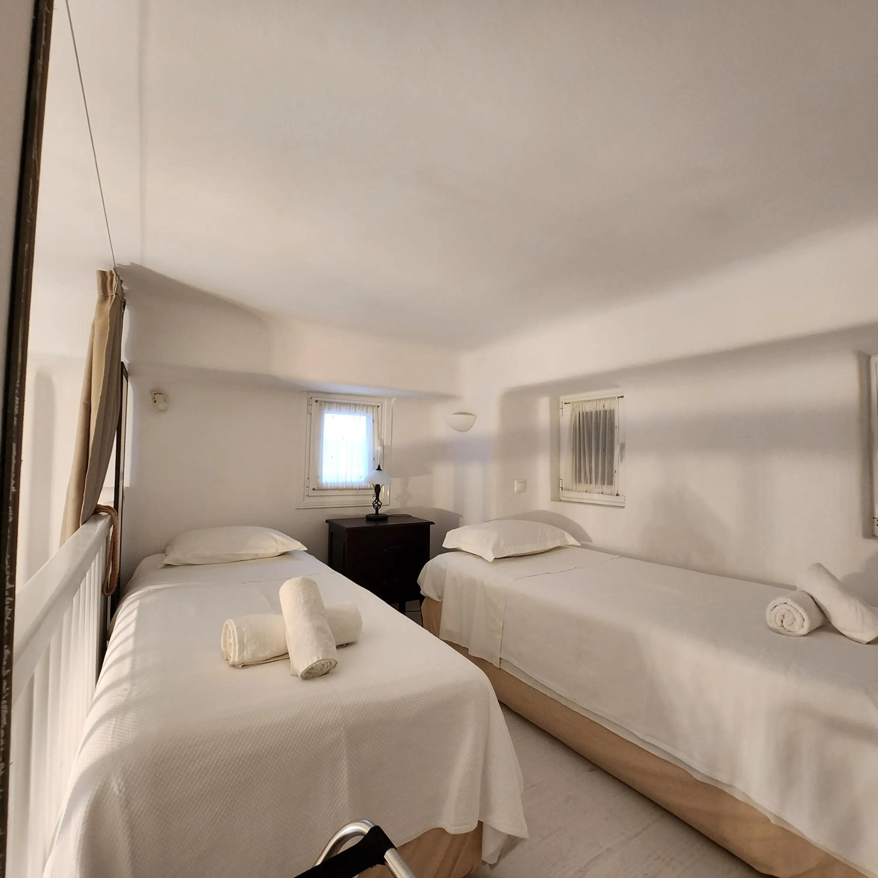 Bed in Mykonian Iros Suites & Villas