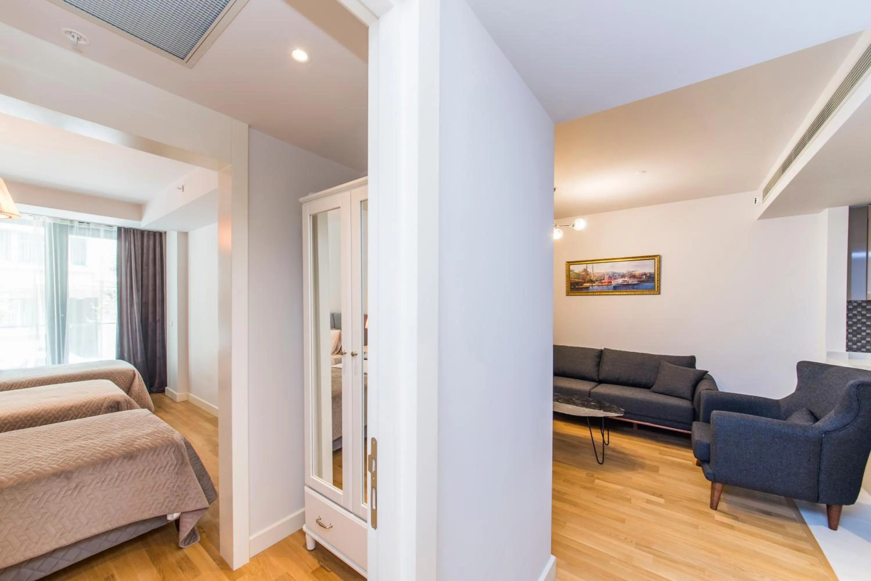 Living room, Bed in Classy Suite Taksim