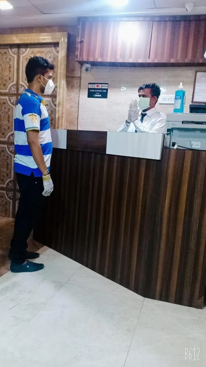 Staff in Hotel Alfa International Near Nanavati Hospital Mumbai Near Airport Mumbai Near Juhu Beach