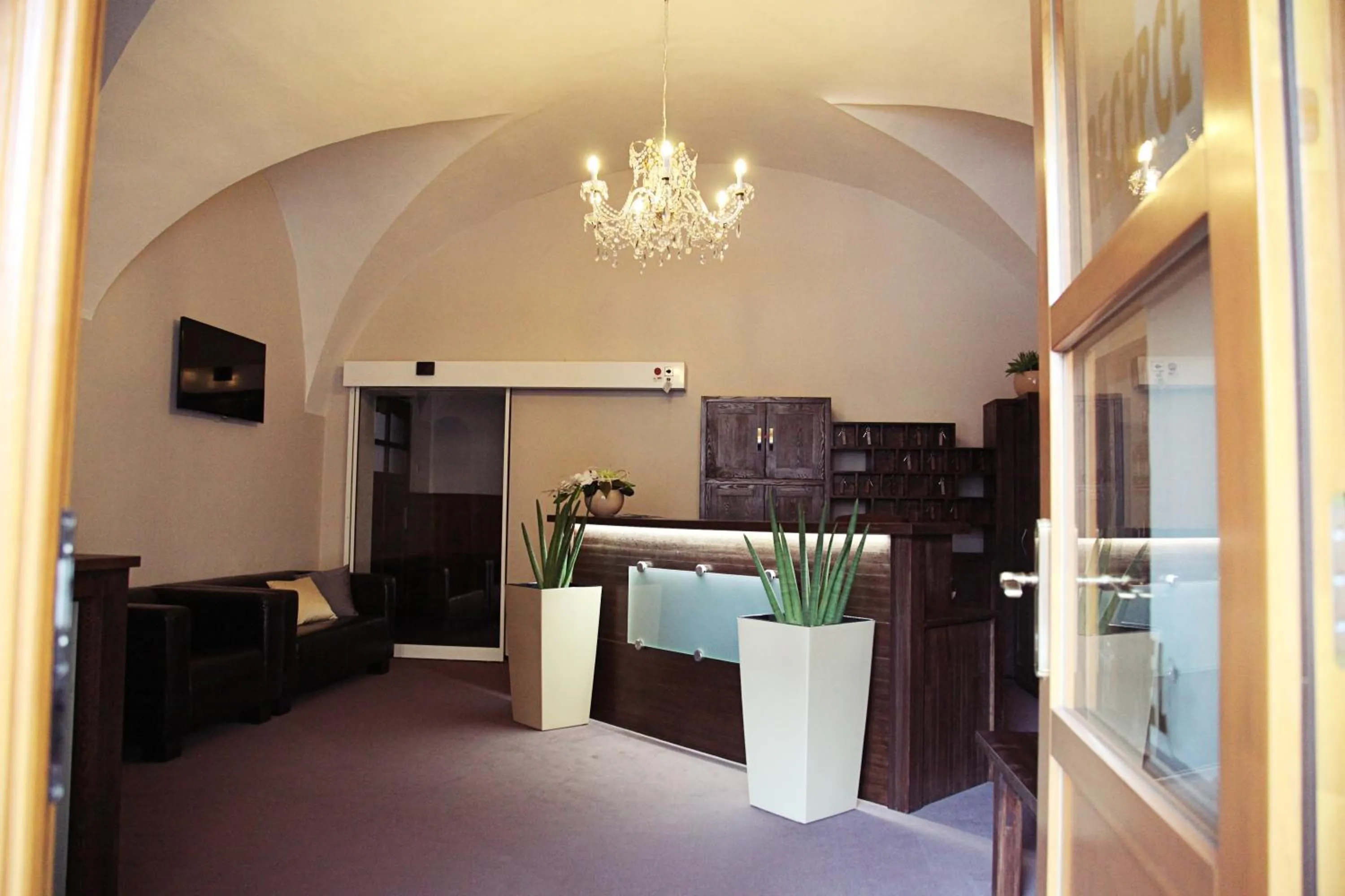 Lobby or reception in Hotel U Hradu