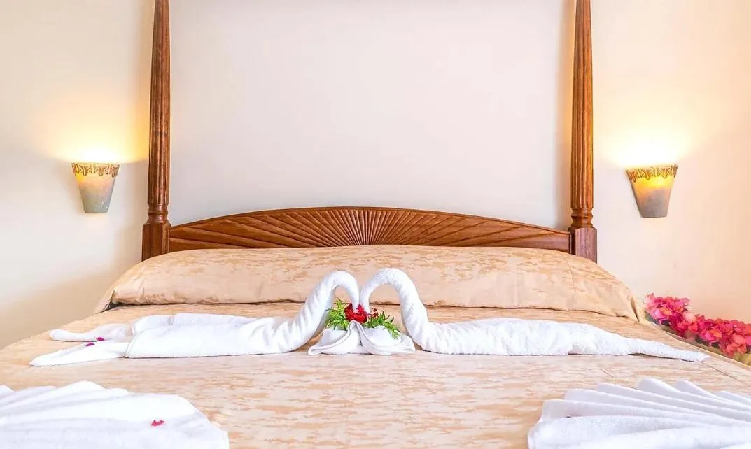 Bed in Sun N Sand Beach Resort