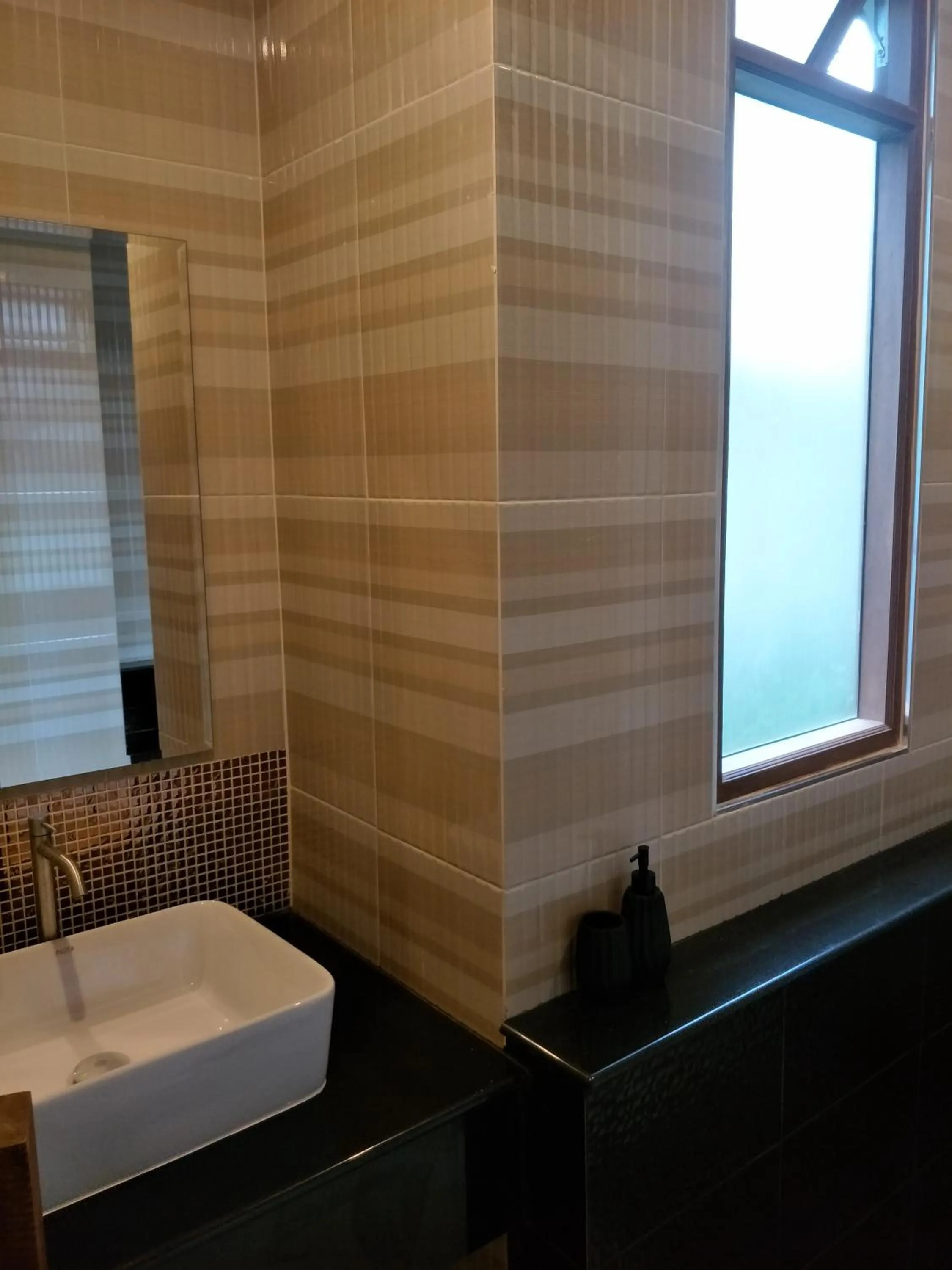 Bathroom in Lanta Infinity Resort - SHA Extra Plus